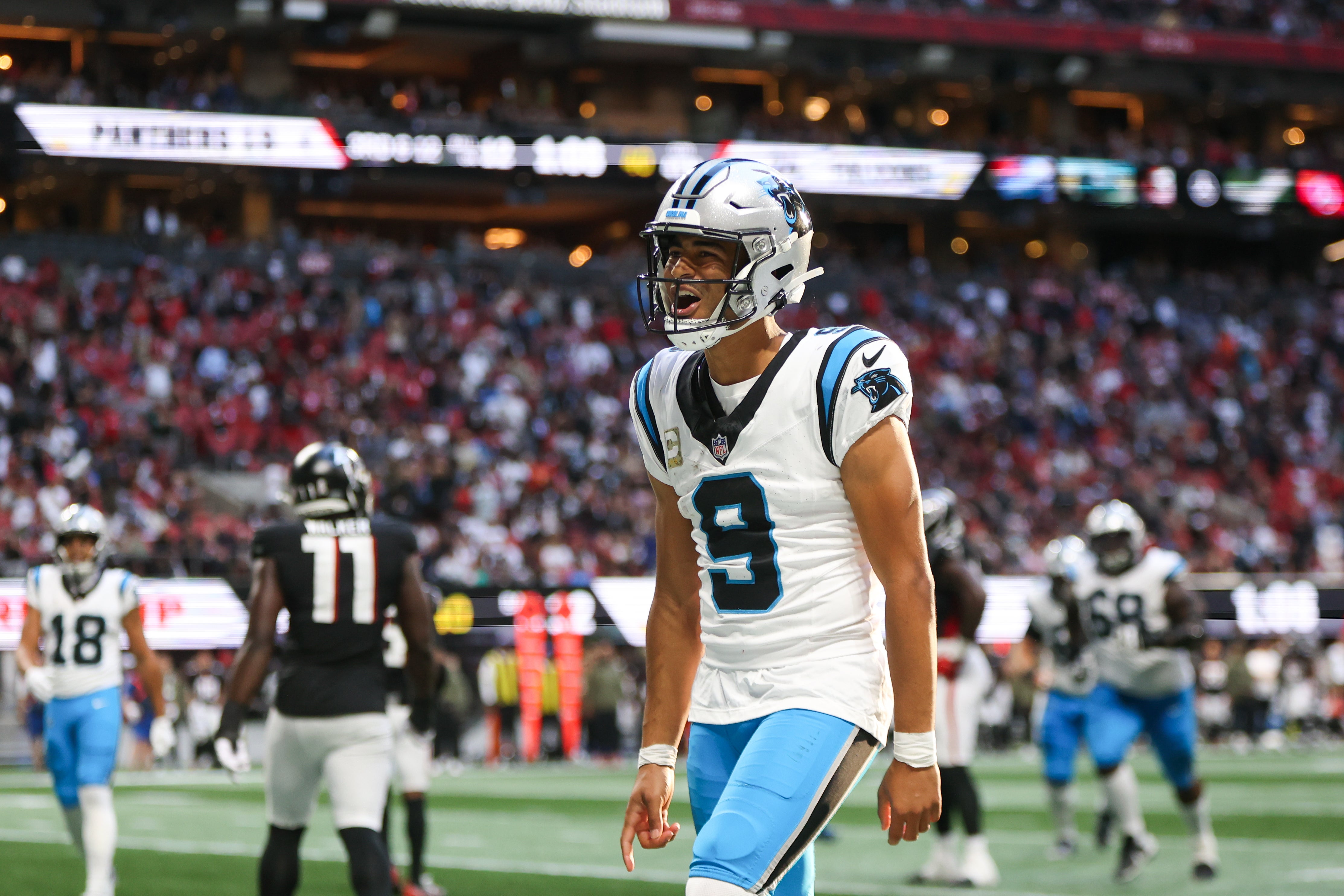 Nov 16, 2025; Atlanta, Georgia, USA; Carolina Panthers quarterback Bryce Young (9) reacts to a touchdown in the fourth quarter against the Atlanta Falcons at Mercedes-Benz Stadium.