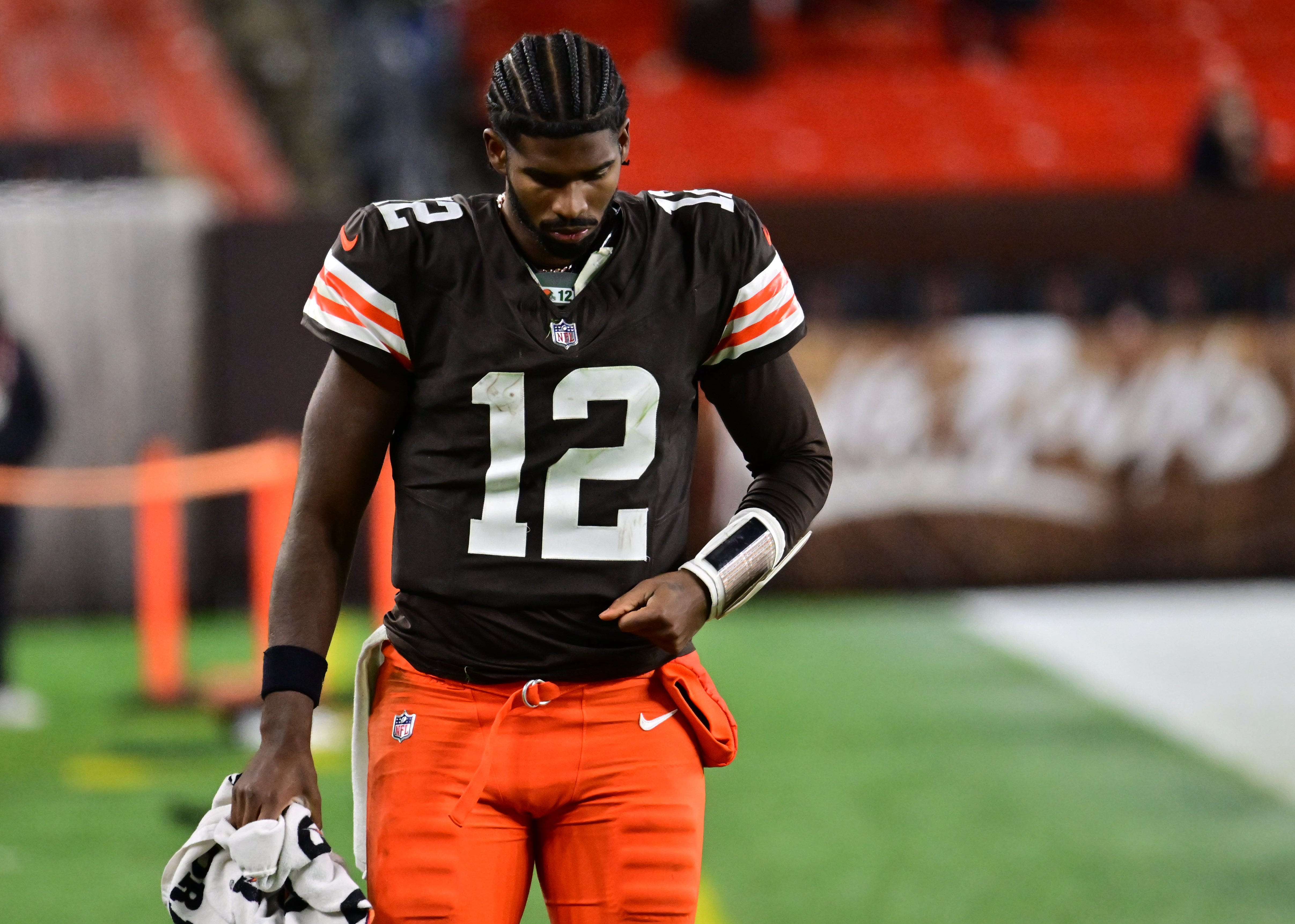Nov 16, 2025; Cleveland, Ohio, USA; Cleveland Browns quarterback Shedeur Sanders (12) walks off the field following a game against the Baltimore Ravens at Huntington Bank Field. Mandatory Credit: Ken Blaze-Imagn Images