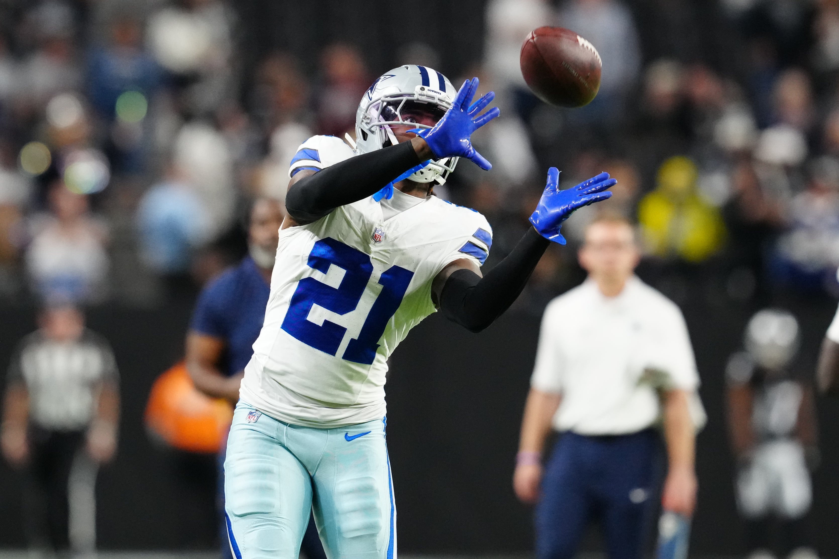 Nov 17, 2025; Paradise, Nevada, USA; Dallas Cowboys cornerback Caelen Carson (21) warms up prior to a game against the Las Vegas Raiders at Allegiant Stadium.