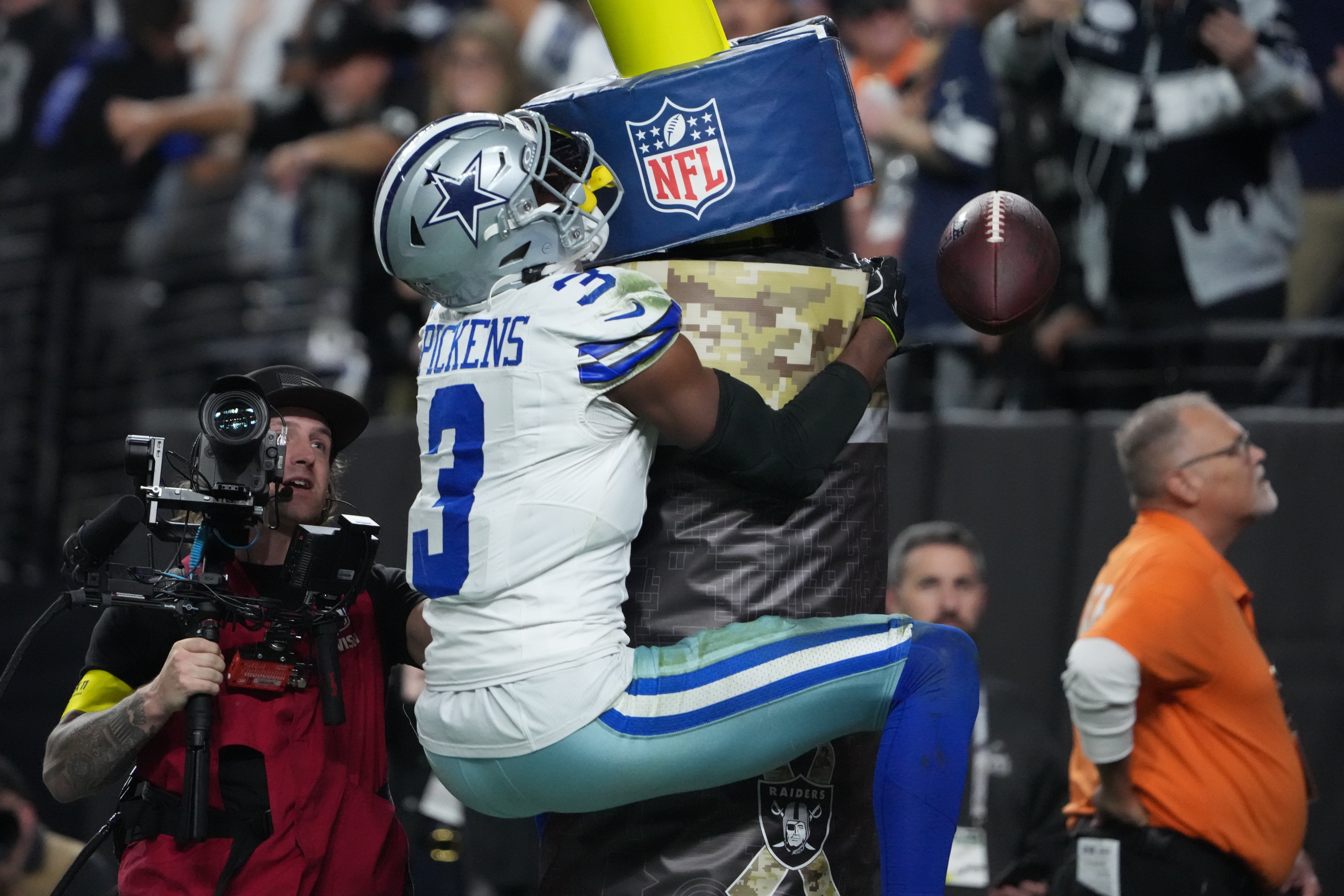 Nov 17, 2025; Paradise, Nevada, USA; Dallas Cowboys wide receiver George Pickens (3) reacts after scoring a touchdown against the Las Vegas Raiders during the first half at Allegiant Stadium.