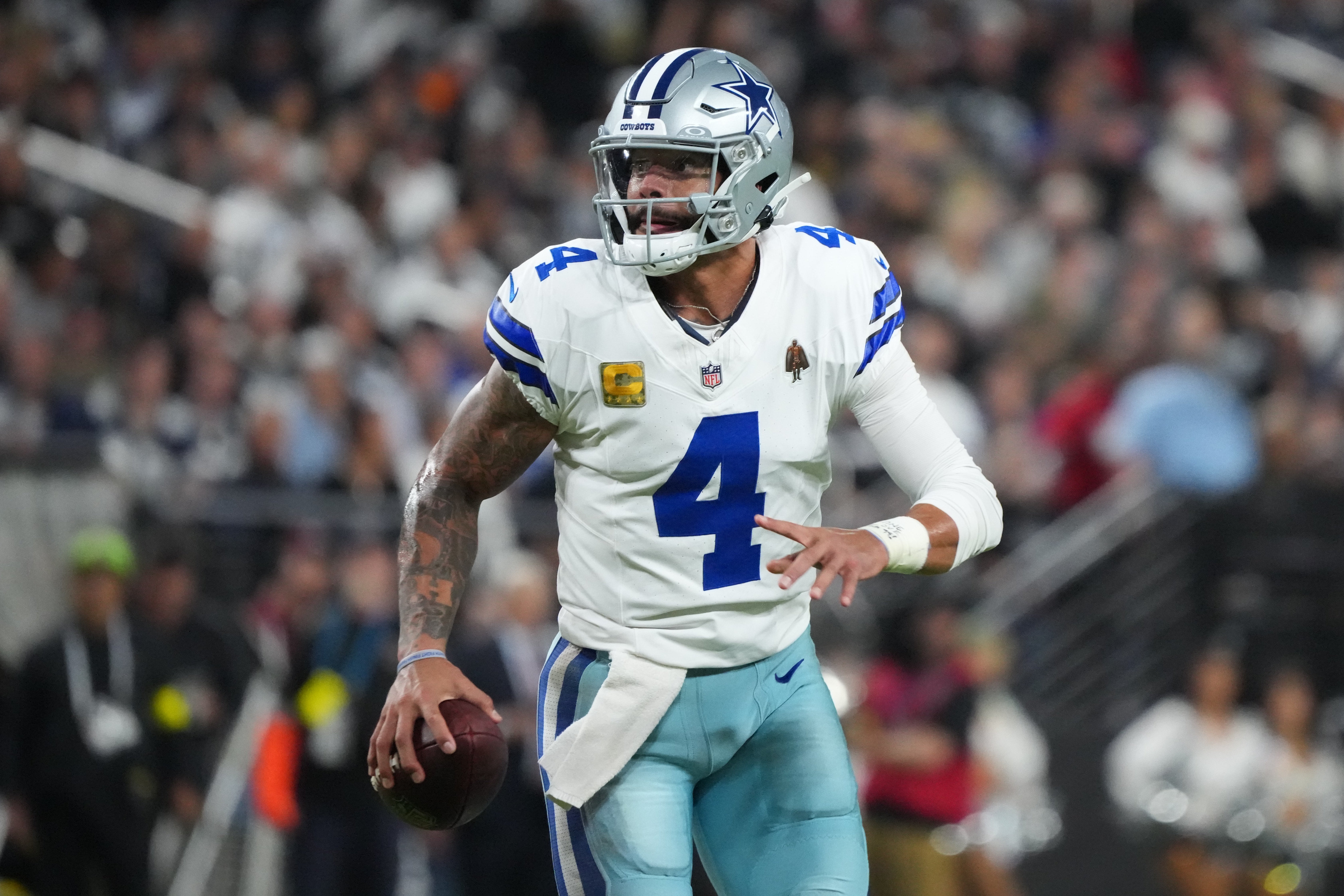 Nov 17, 2025; Paradise, Nevada, USA; Dallas Cowboys quarterback Dak Prescott (4) looks to pass against the Las Vegas Raiders during the second half at Allegiant Stadium.