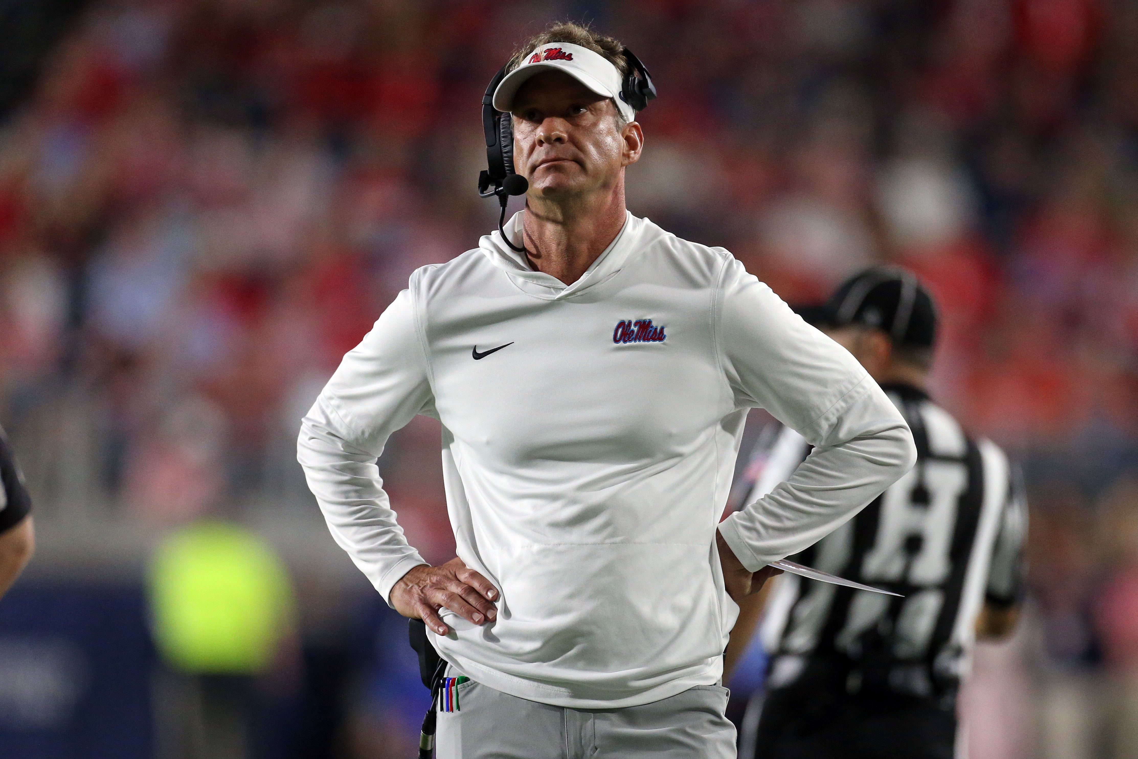 Nov 15, 2025; Oxford, Mississippi, USA; Mississippi Rebels head coach Lane Kiffin looks on during a time out during the first quarter against the Florida Gators at Vaught-Hemingway Stadium.
