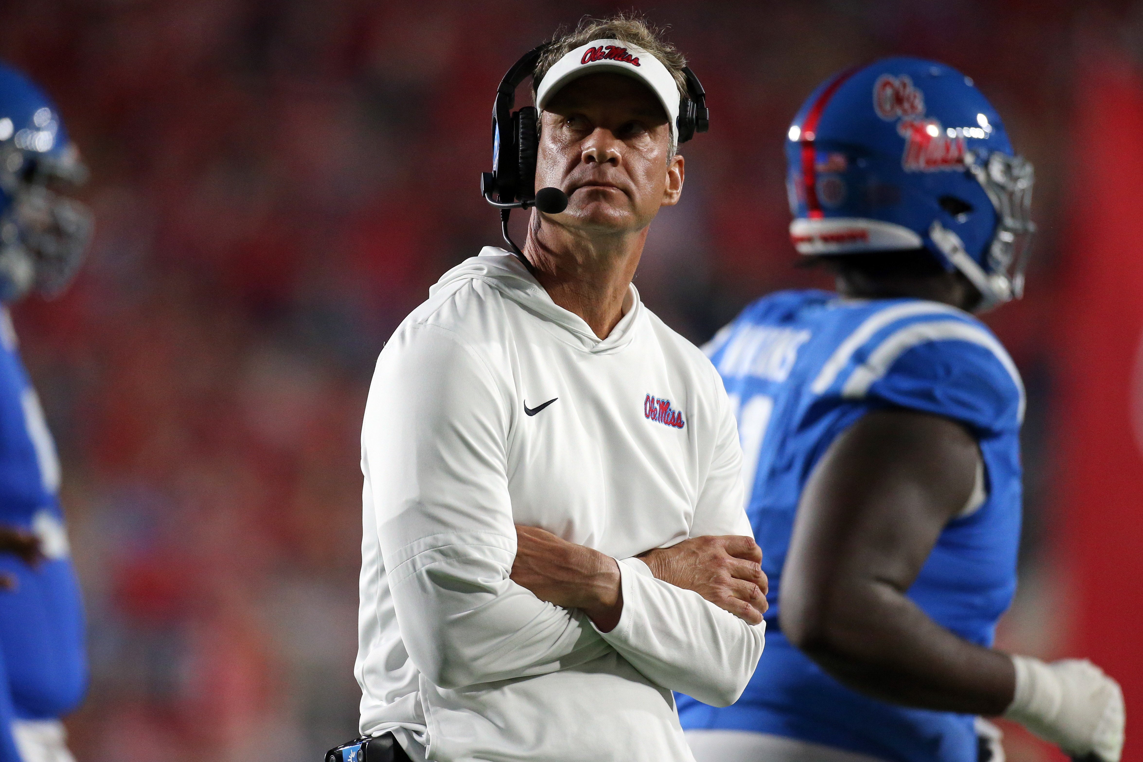 Nov 15, 2025; Oxford, Mississippi, USA; Mississippi Rebels head coach Lane Kiffin looks on during a time out during the first quarter against the Florida Gators at Vaught-Hemingway Stadium. Mandatory Credit: Petre Thomas-Imagn Images
