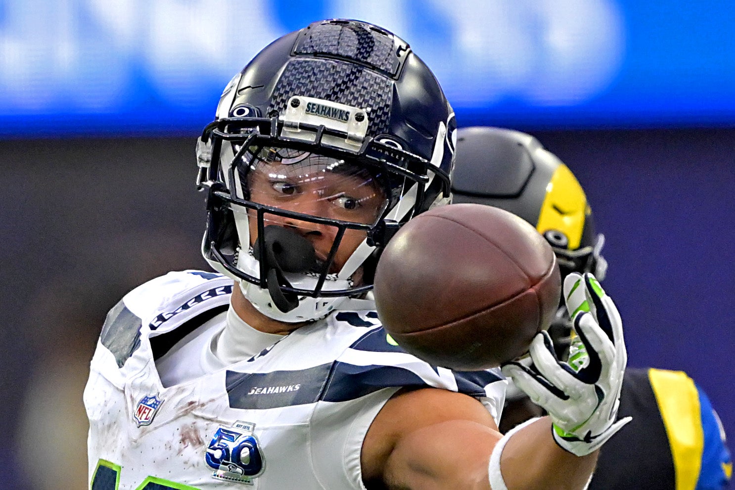 Nov 16, 2025; Inglewood, California, USA; Seattle Seahawks wide receiver Jaxon Smith-Njigba (11) makes a fingertip catch against the Los Angeles Rams at SoFi Stadium.