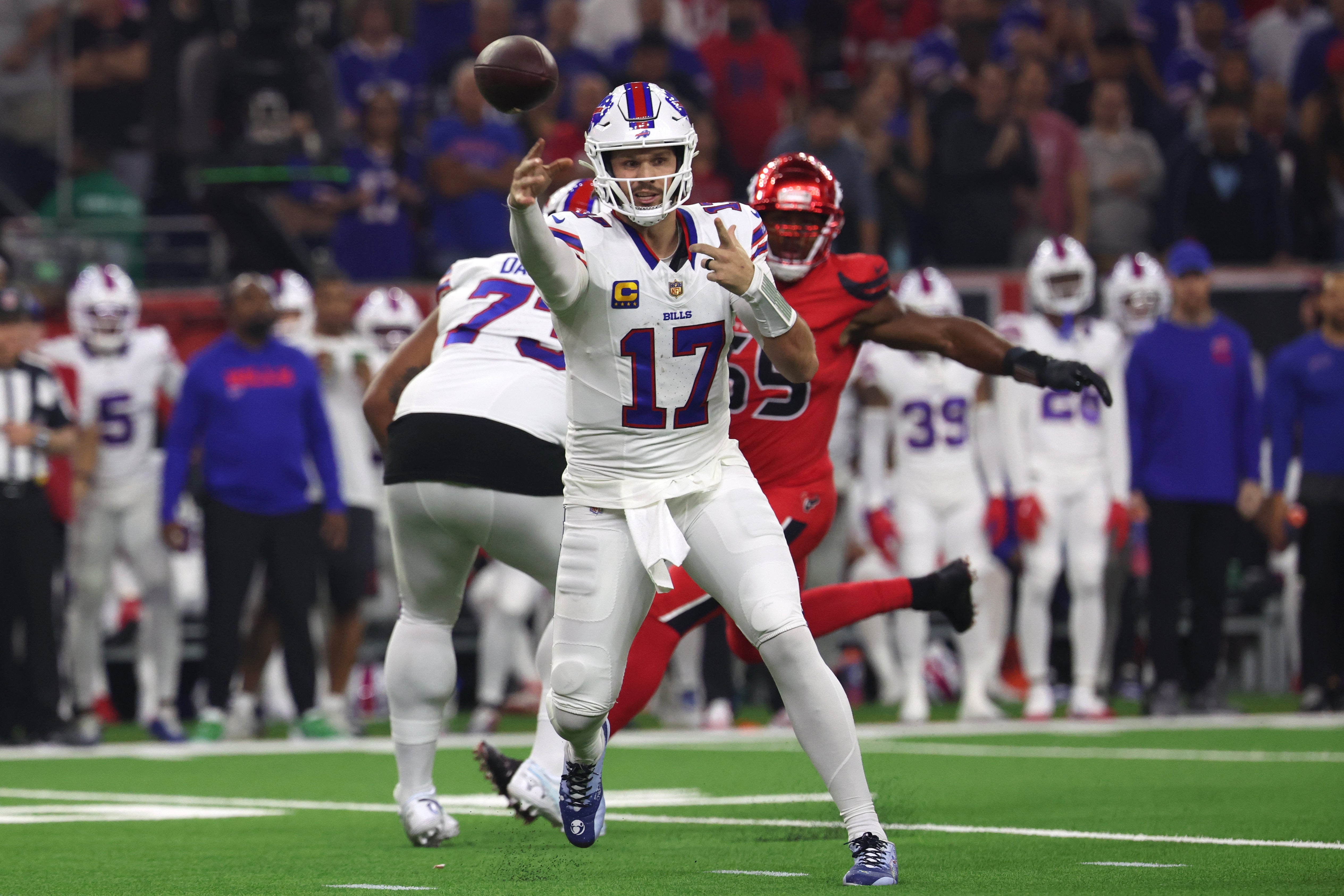 Nov 20, 2025; Houston, Texas, USA; Buffalo Bills quarterback Josh Allen (17) throws a pass against the Houston Texans in the first quarter at NRG Stadium.