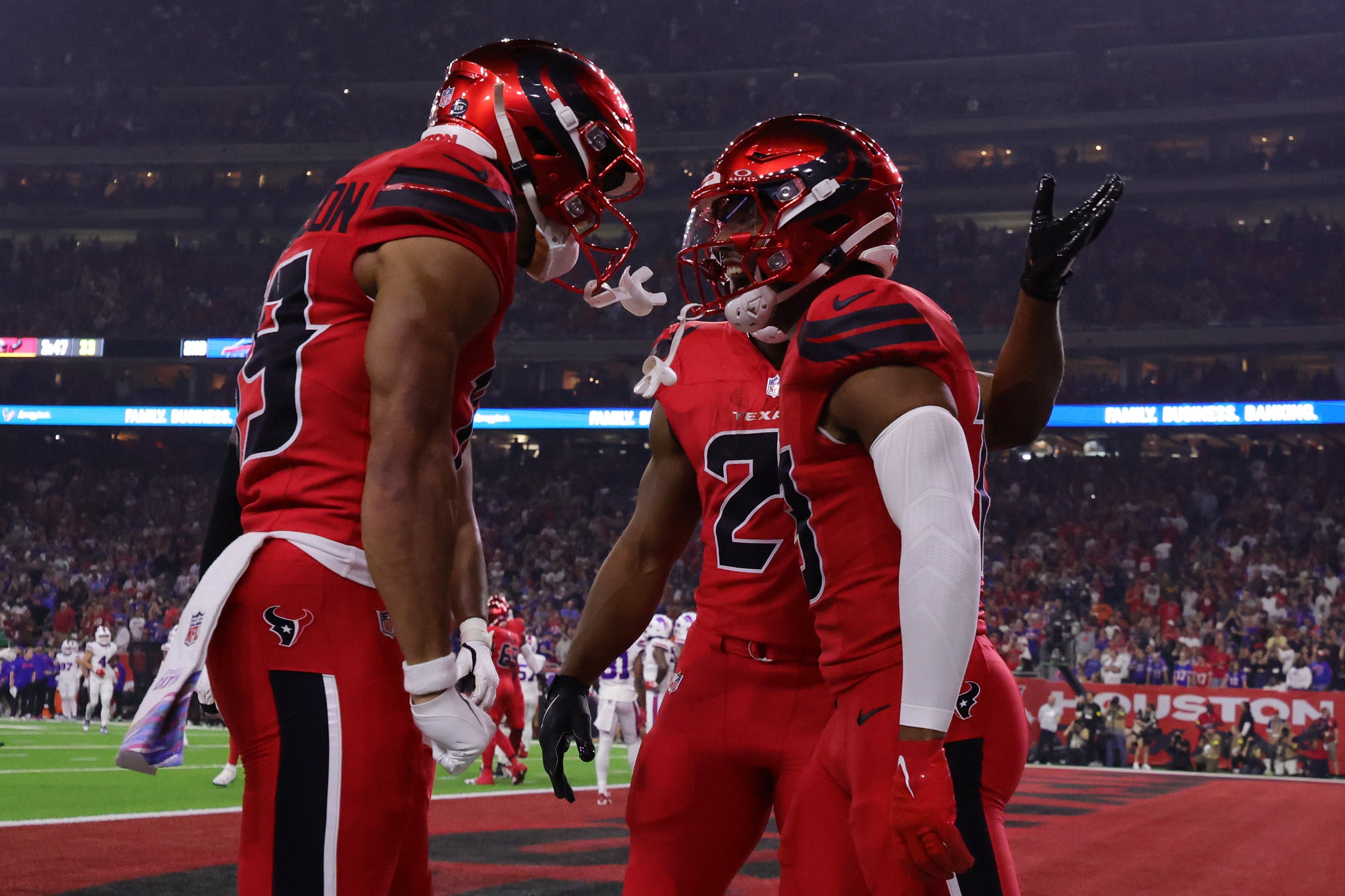 Nov 20, 2025; Houston, Texas, USA; Houston Texans wide receiver Christian Kirk (13) celebrates with wide receiver Xavier Hutchinson (19) after scoring a touchdown against the Buffalo Bills in the second quarter at NRG Stadium.
