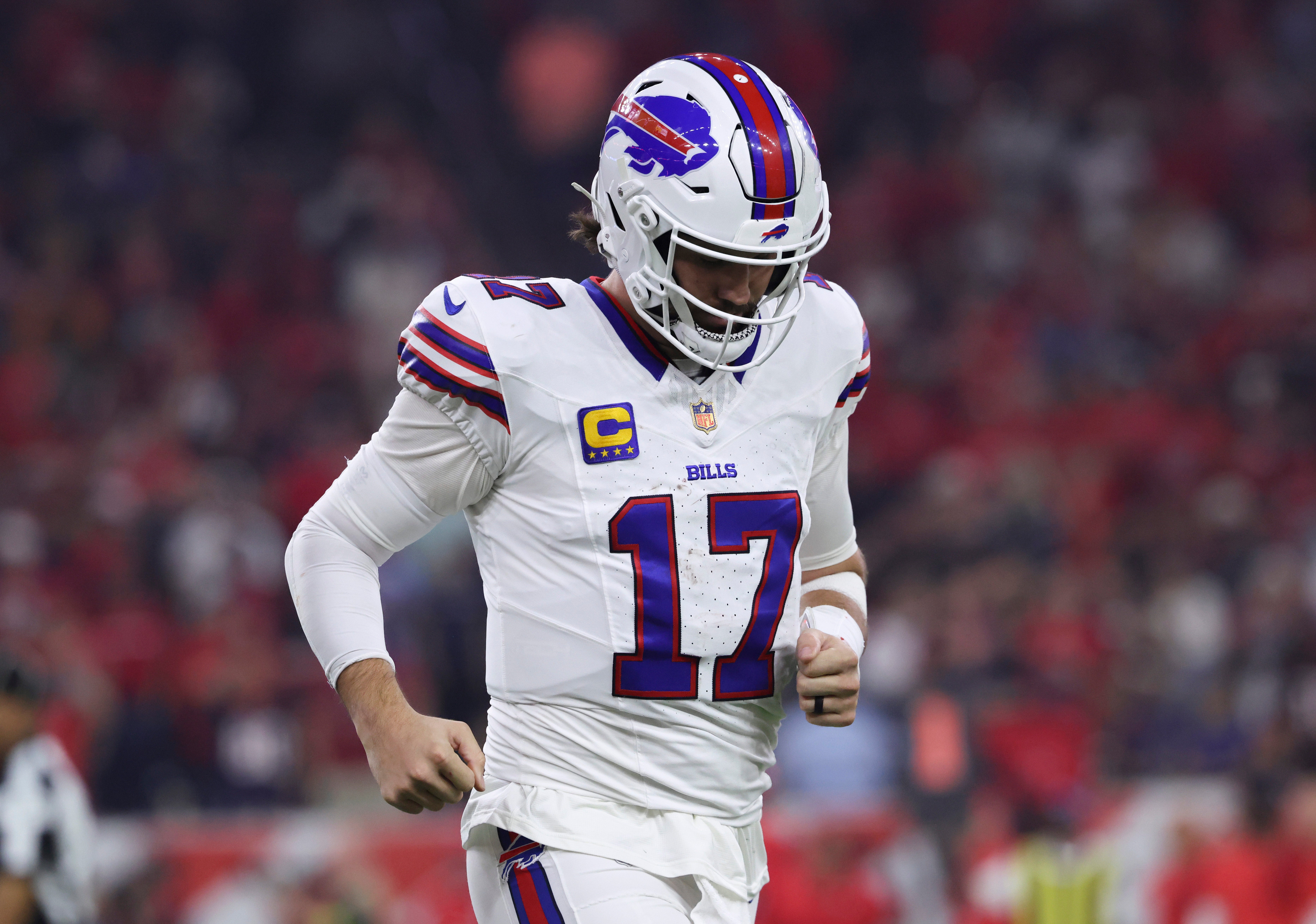 Nov 20, 2025; Houston, Texas, USA; Buffalo Bills quarterback Josh Allen (17) walks off the field after a play during the game against the Houston Texans at NRG Stadium.