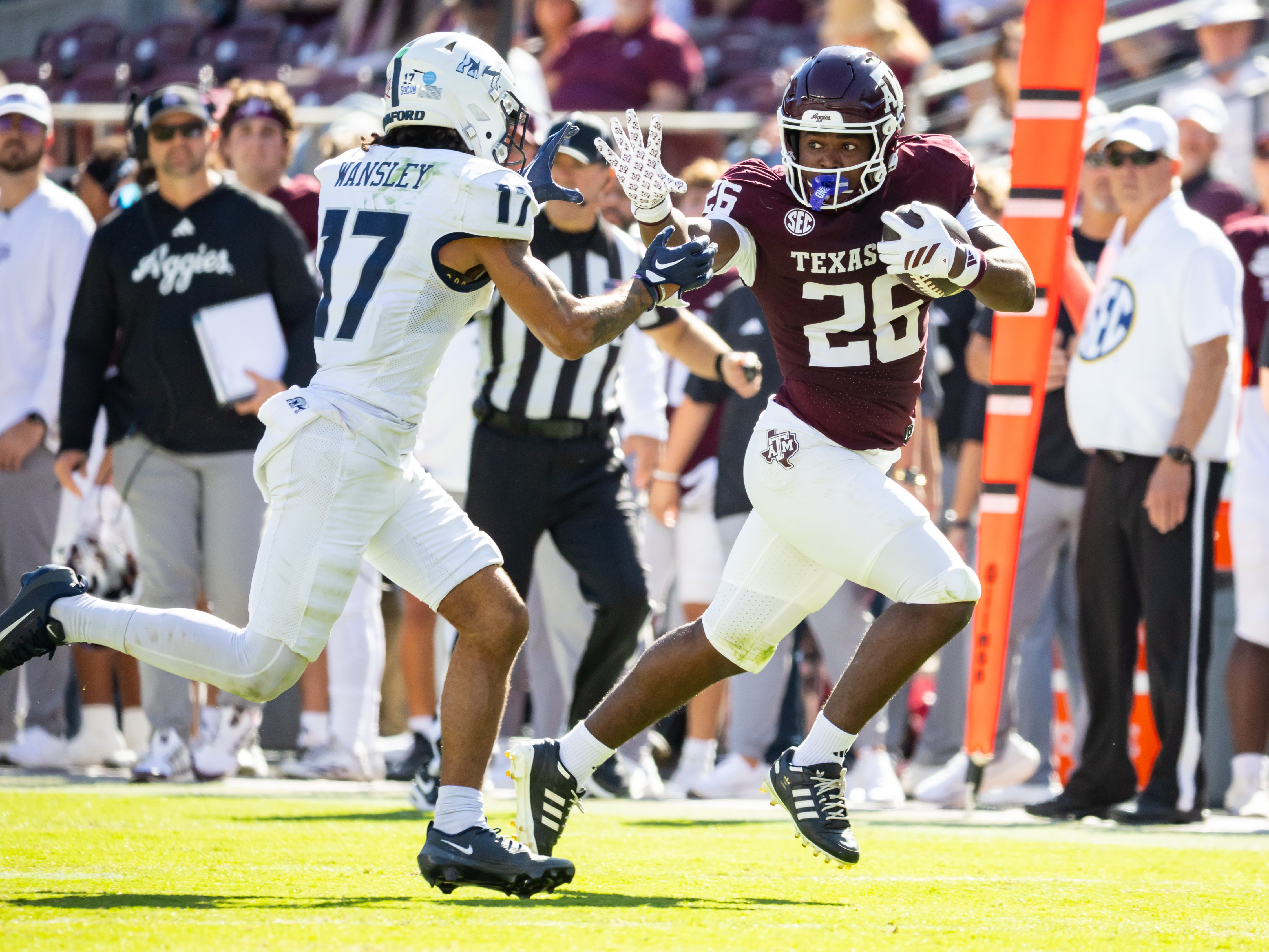 Nov 22, 2025; College Station, Texas, USA; Texas A&M Aggies running back Tiger Riden Jr. (26) runs with the ball in the second half of a game against the Samford Bulldogs at Kyle Field.