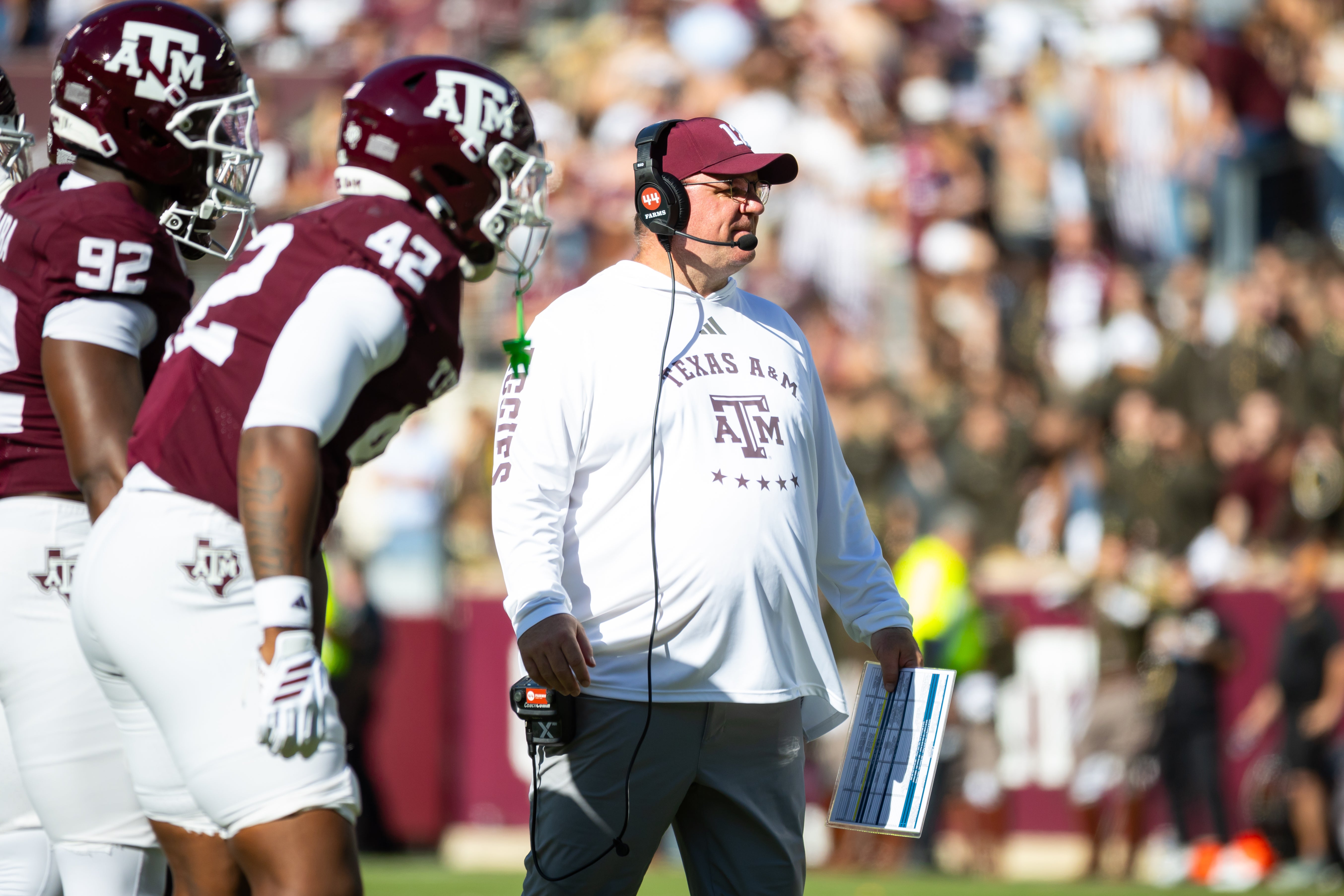 Nov 22, 2025; College Station, Texas, USA; Texas A&M Aggies head coach Mike Elko on the field in the second half of a game against the Samford Bulldogs at Kyle Field.