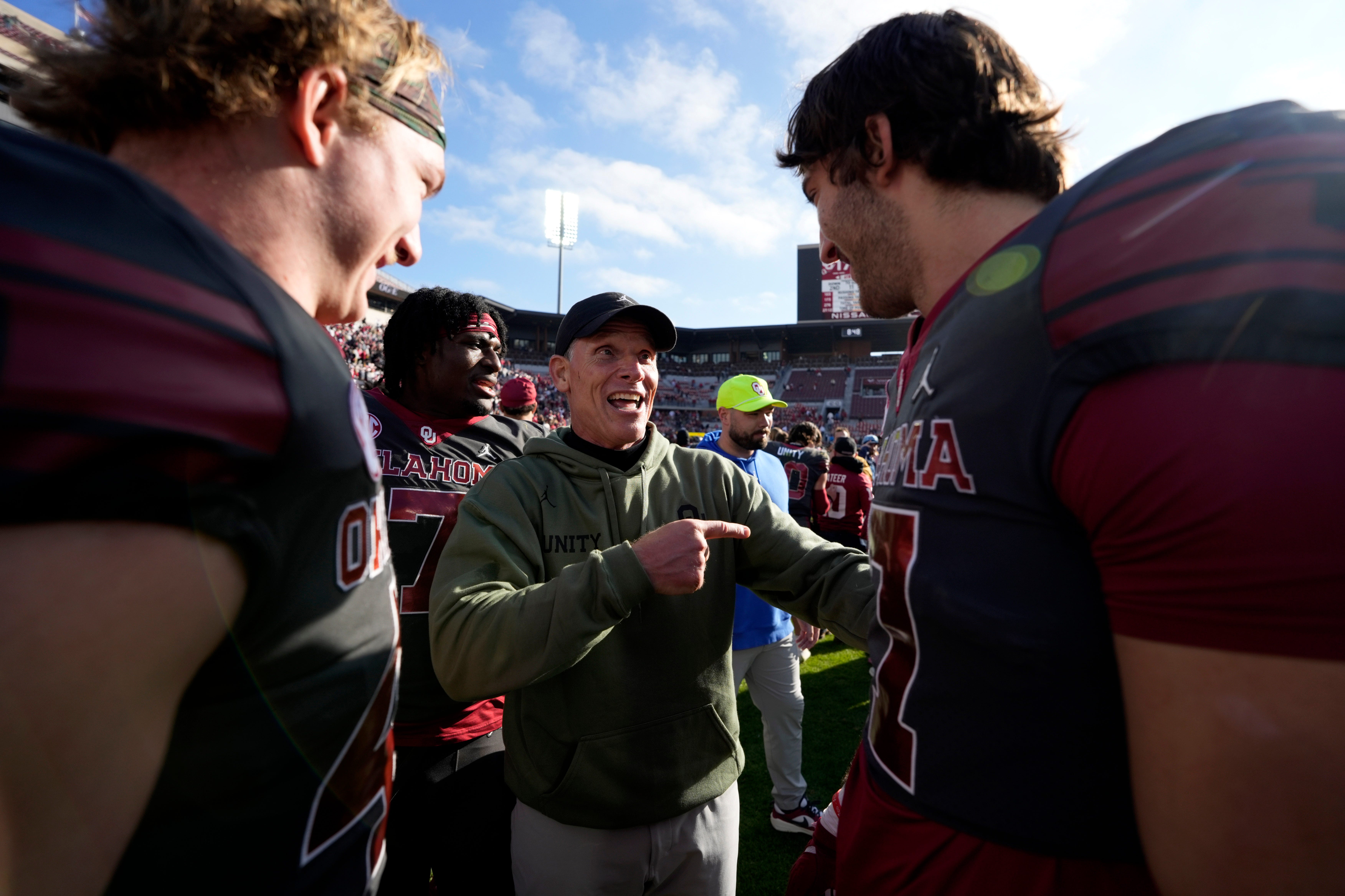 Oklahoma coach Brent Venables celebrates with players after a college football game between the University of Oklahoma Sooners (OU) and the Missouri Tigers at Gaylord Family Ð Oklahoma Memorial Stadium in Norman, Okla., on Saturday, Nov. 22, 2025. Oklahoma won 17-6.