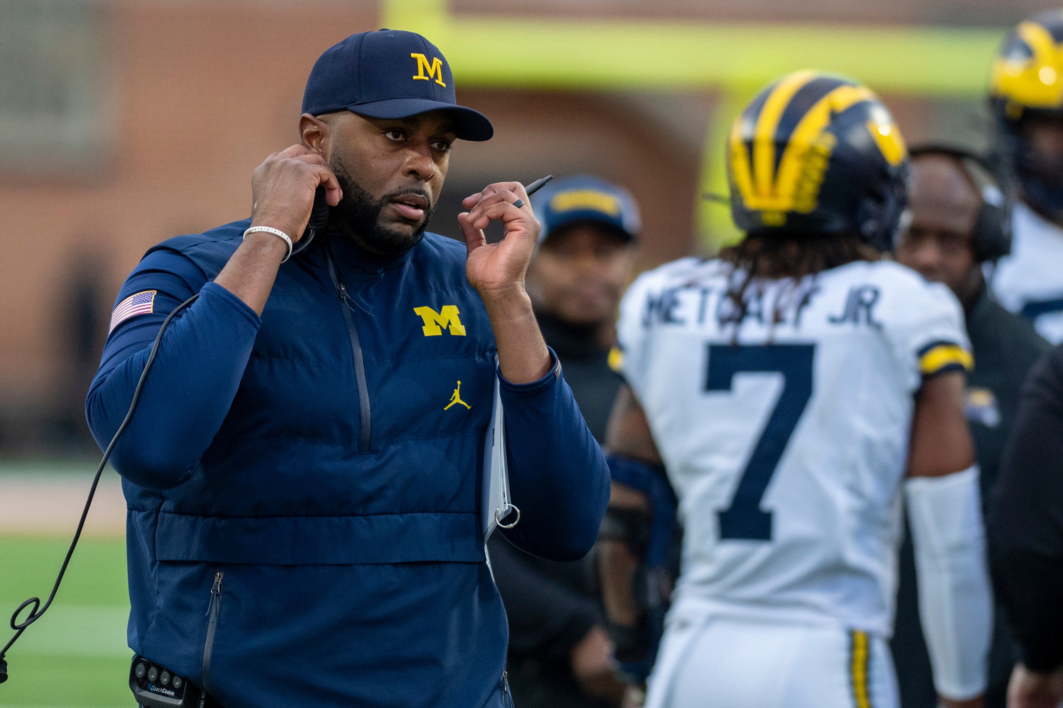 Nov 22, 2025; College Park, Maryland, USA; Michigan Wolverines head coach Sherrone Moore on the sidelines during the first quarter against the Maryland Terrapins at SECU Stadium.