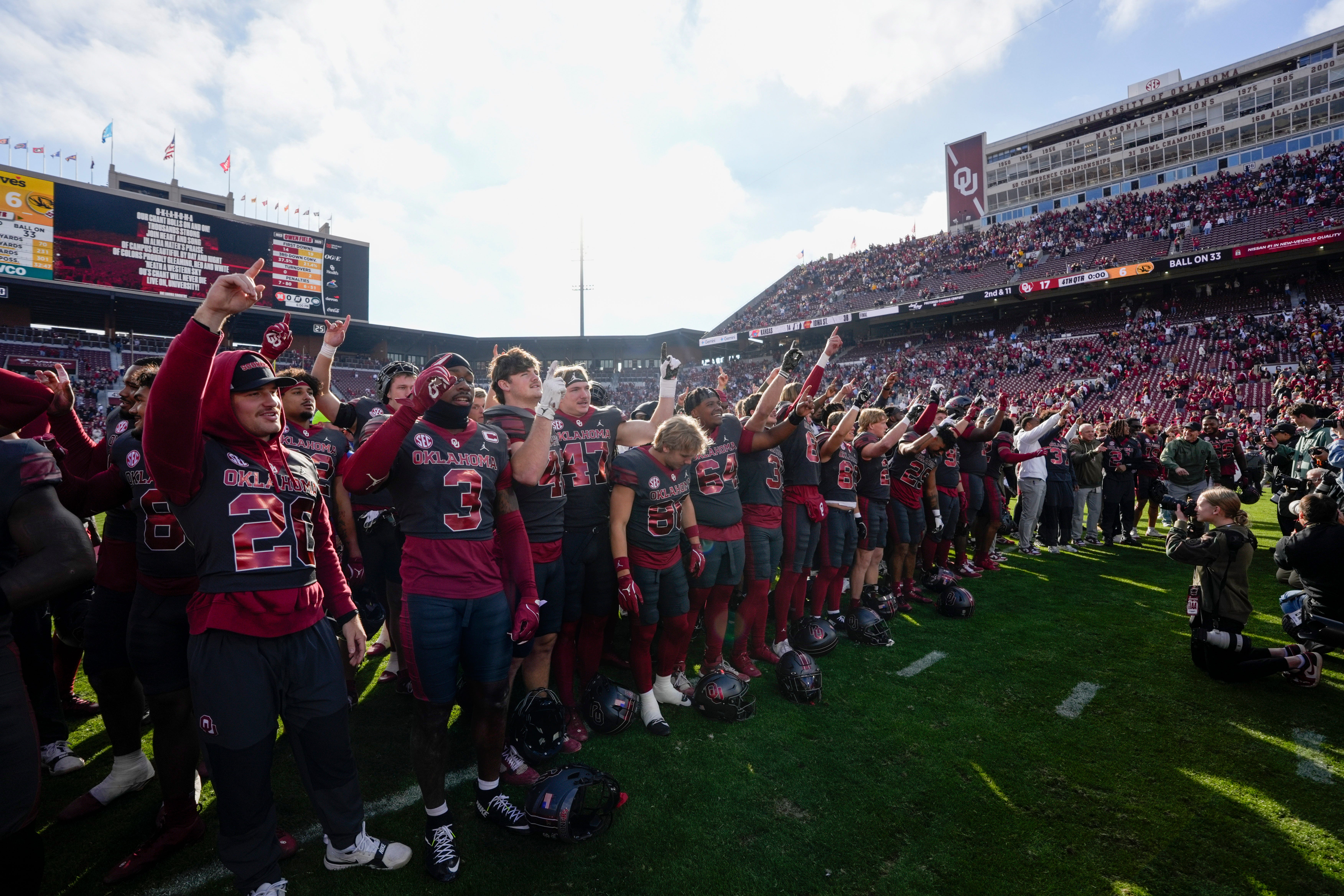 Oklahoma players sign their alma mater after a college football game between the University of Oklahoma Sooners (OU) and the Missouri Tigers at Gaylord Family Ð Oklahoma Memorial Stadium in Norman, Okla., on Saturday, Nov. 22, 2025. Oklahoma won 17-6.