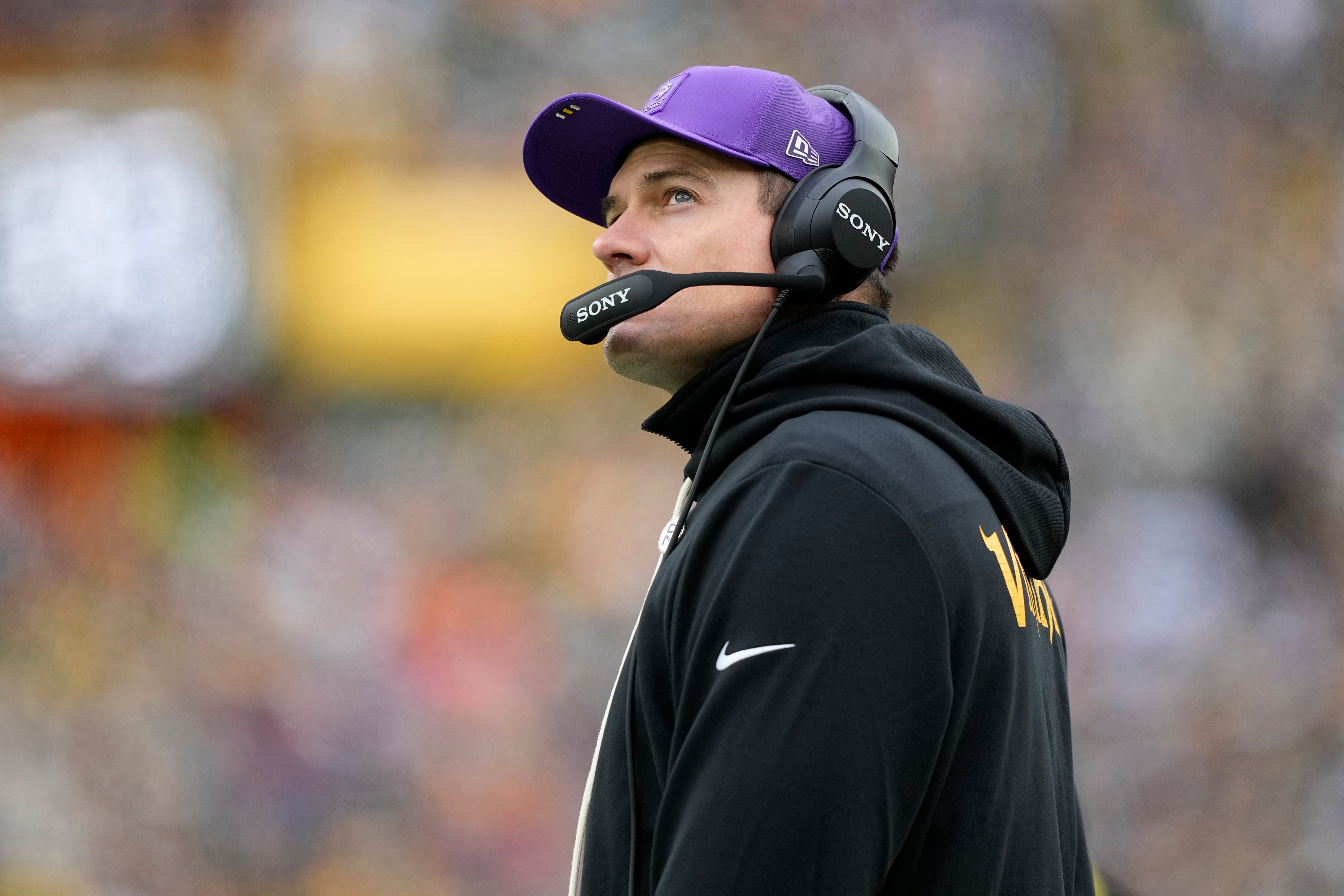 Nov 23, 2025; Green Bay, Wisconsin, USA; Minnesota Vikings head coach Kevin O'Connell on the sidelines against the Green Bay Packers during the first half at Lambeau Field.