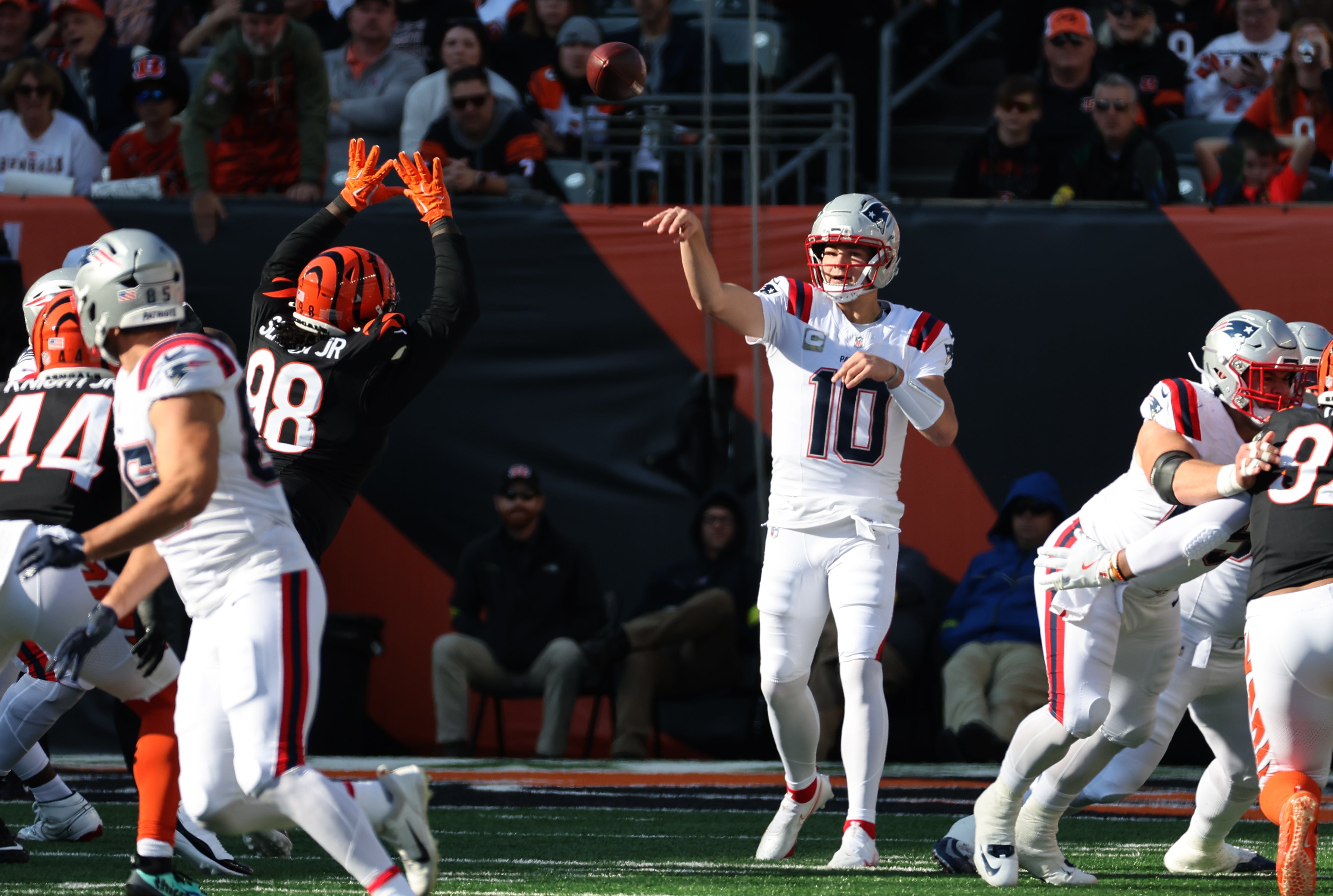 Nov 23, 2025; Cincinnati, Ohio, USA; New England Patriots quarterback Drake Maye (10) throws during the first half against the Cincinnati Bengals at Paycor Stadium. Mandatory Credit: Joseph Maiorana-Imagn Images