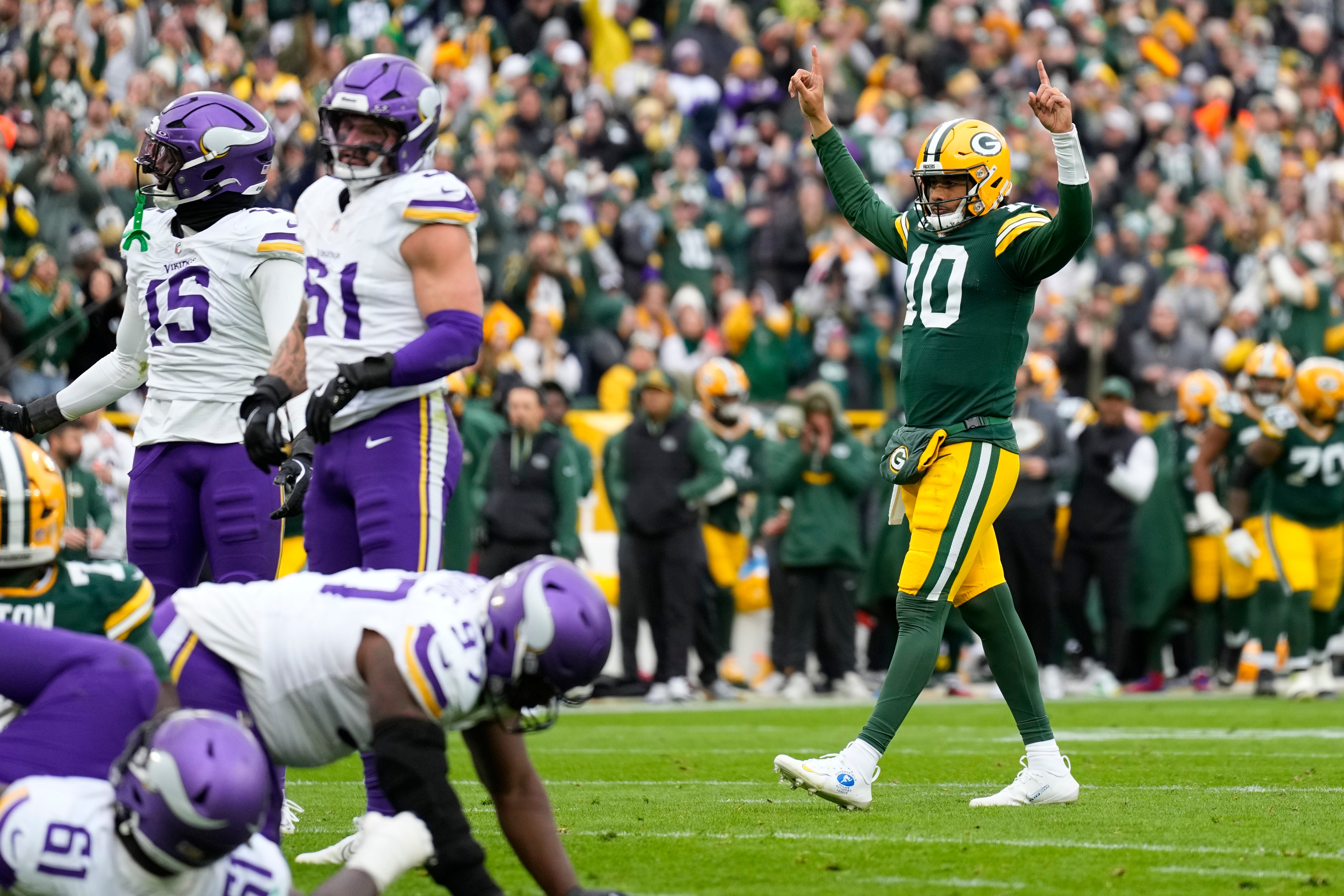Nov 23, 2025; Green Bay, Wisconsin, USA; Green Bay Packers quarterback Jordan Love (10) reacts after a touchdown run against the Minnesota Vikings during the second half at Lambeau Field.