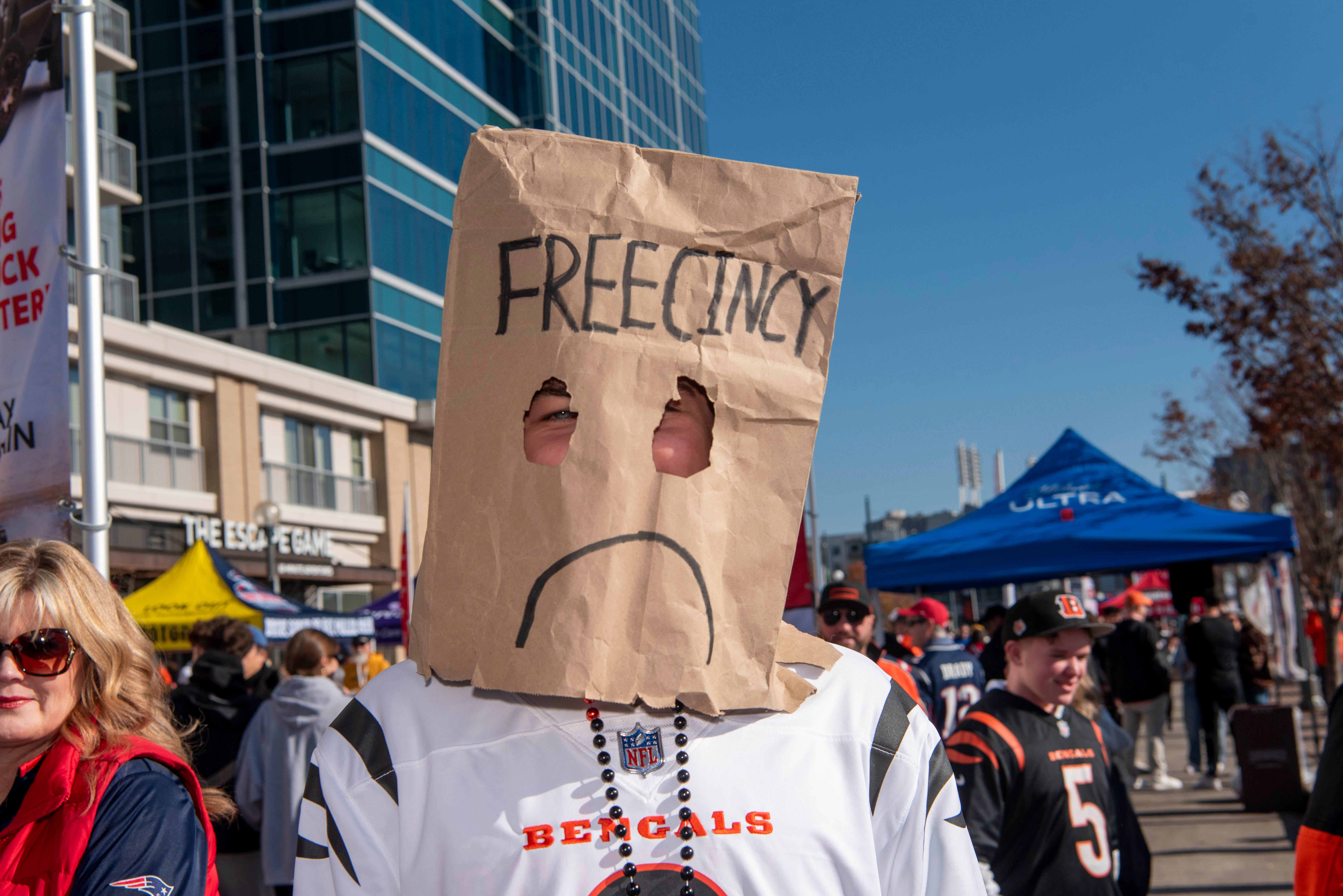 The Cincinnati Bengals (3-7) hosts the New England Patriots (9-2) at Paycor Stadium on Nov. 23, 2025 in week 12 of the NFL season. Bengal fans continue to hold large tailgating parties in lots around the stadium. The Bag Man makes his way along Freedon Way.
