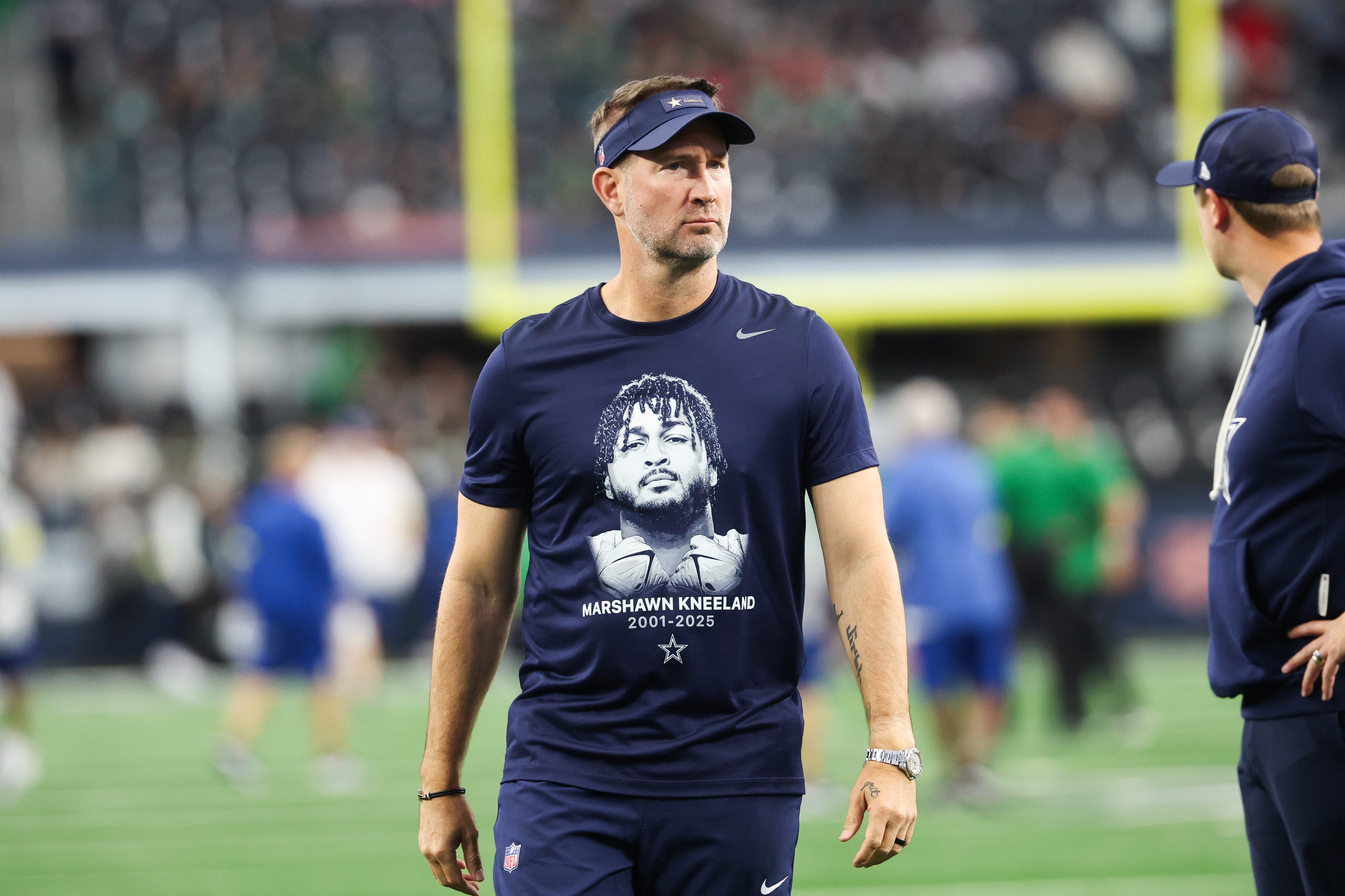 Nov 23, 2025; Arlington, Texas, USA; Dallas Cowboys head coach Brian Schottenheimer looks on before the game against the Philadelphia Eagles at AT&T Stadium.