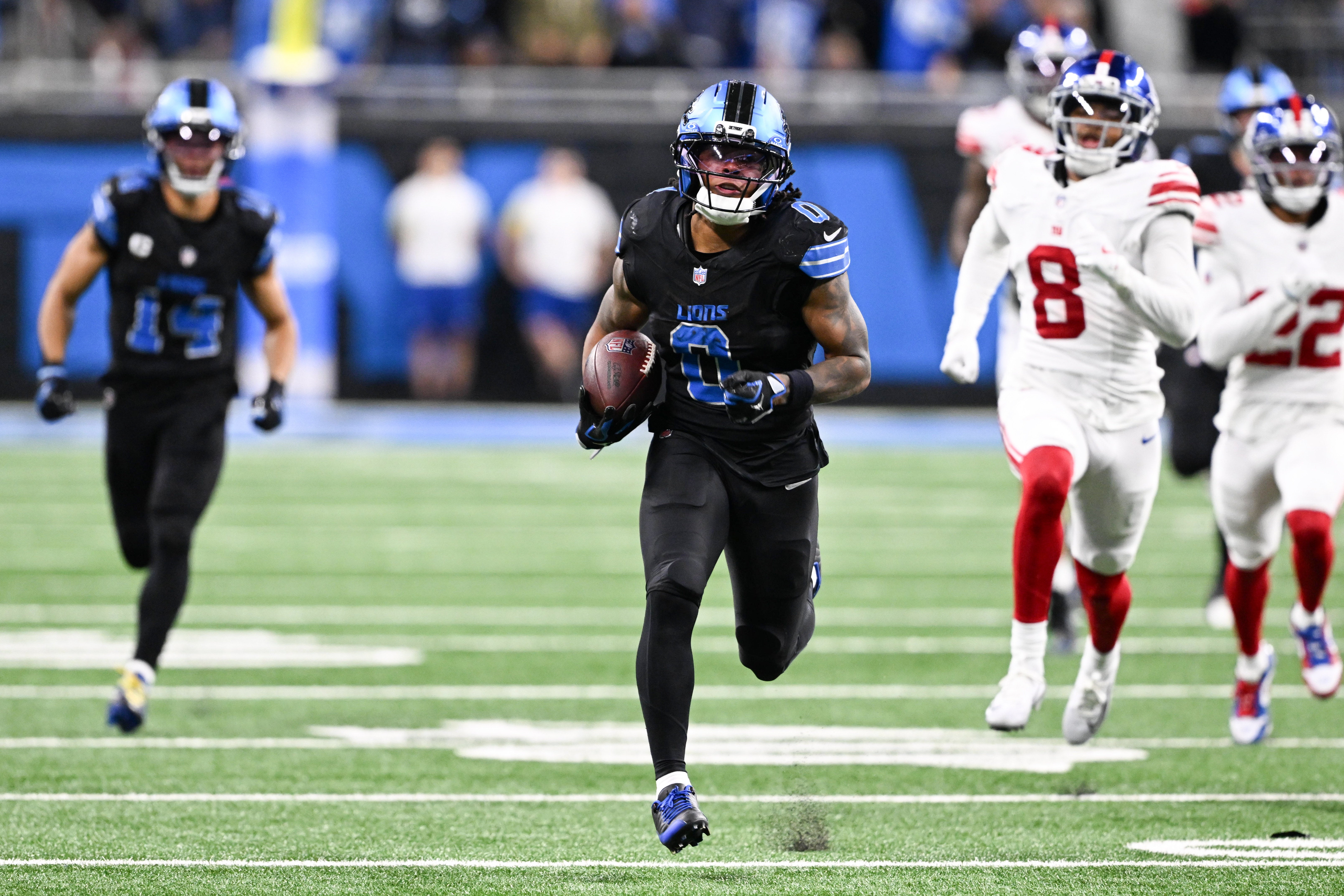Nov 23, 2025; Detroit, Michigan, USA; Detroit Lions running back Jahmyr Gibbs (0) runs the ball for a touchdown in over time against the New York Giants at Ford Field.