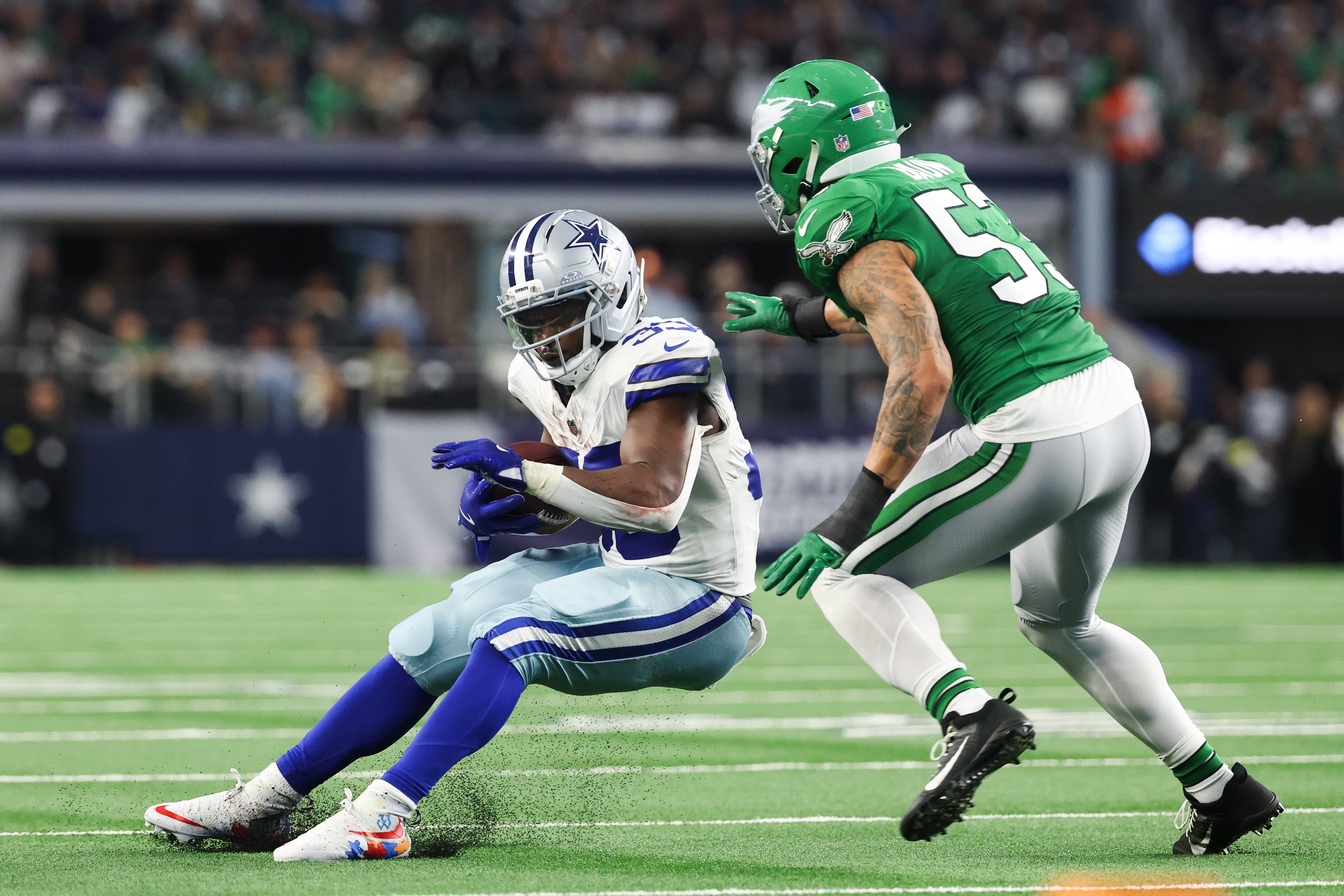 Nov 23, 2025; Arlington, Texas, USA; Dallas Cowboys running back Javonte Williams (33) runs with the ball in the second quarter against the Philadelphia Eagles at AT&T Stadium.