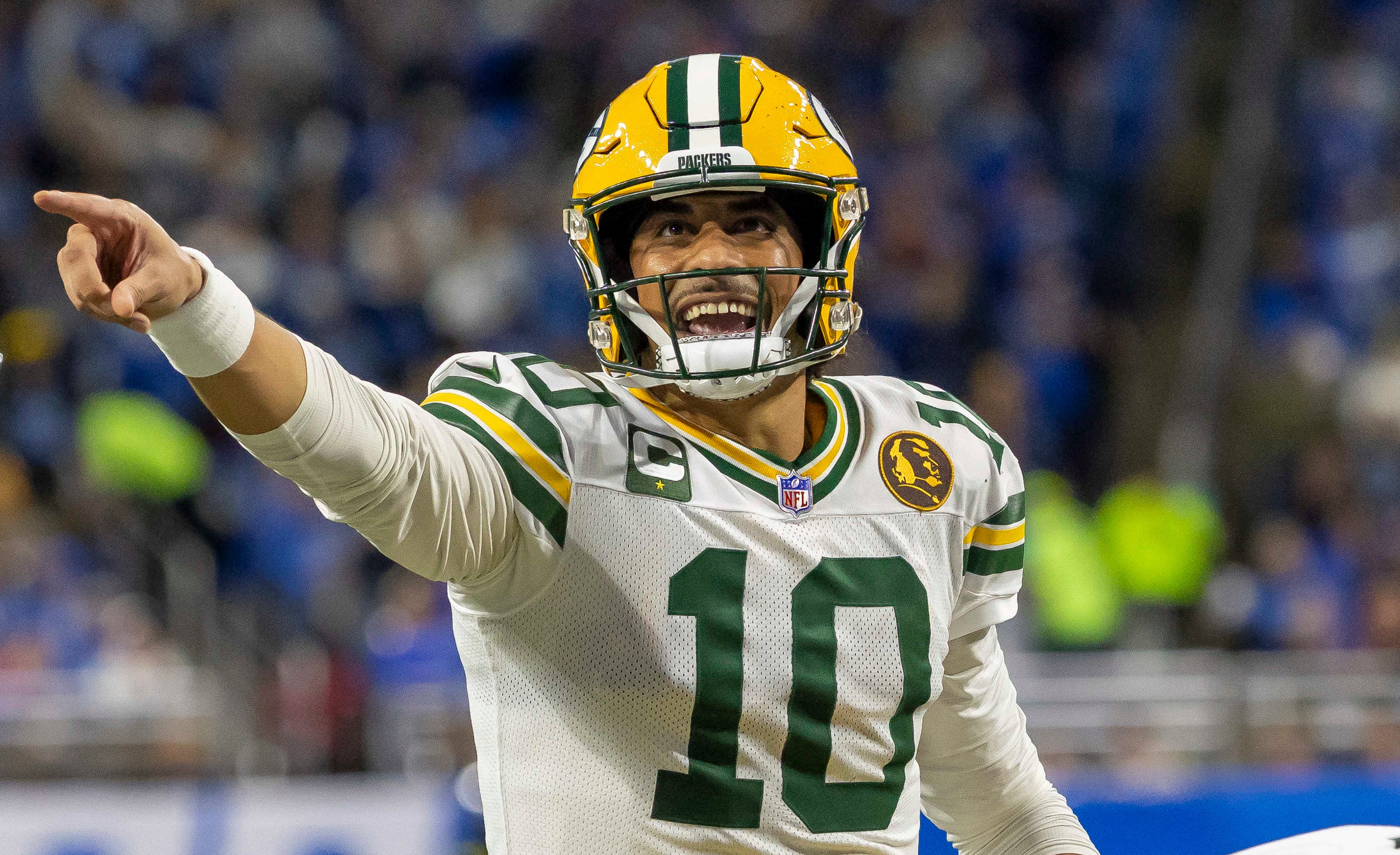 Nov 27, 2025; Detroit, Michigan, USA; Green Bay Packers quarterback Jordan Love (10) calls a play against the Detroit Lions during the second quarter at Ford Field.