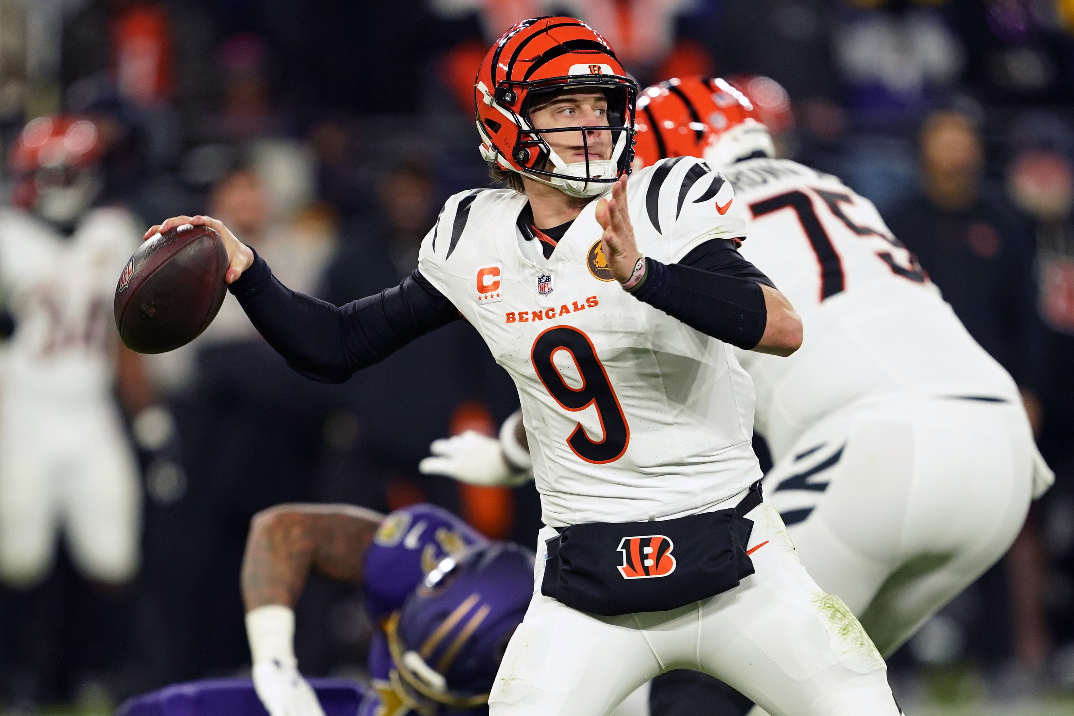 Nov 27, 2025; Baltimore, Maryland, USA; Cincinnati Bengals quarterback Joe Burrow (9) drops back to pass against the Baltimore Ravens during the first half at M&T Bank Stadium.