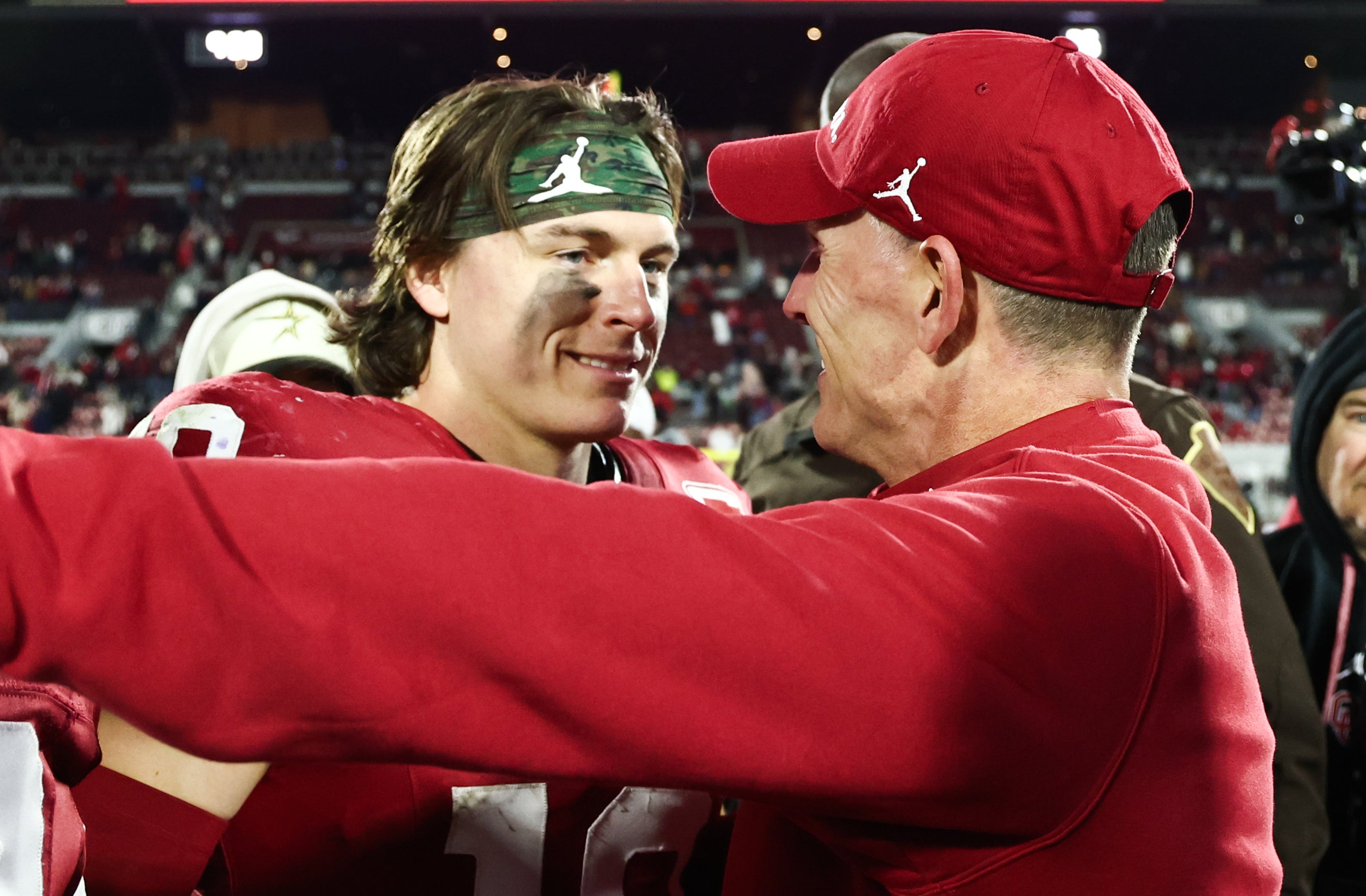 Oklahoma Sooners head coach Brent Venables quarterback John Mateer after beating LSU Tigers