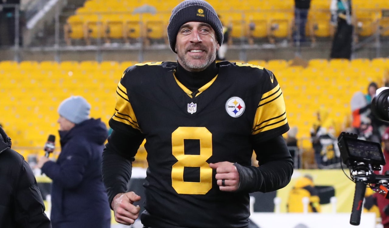 Dec 15, 2025; Pittsburgh, Pennsylvania, USA; Pittsburgh Steelers quarterback Aaron Rodgers (8) runs off the field after the game against the Miami Dolphins at Acrisure Stadium