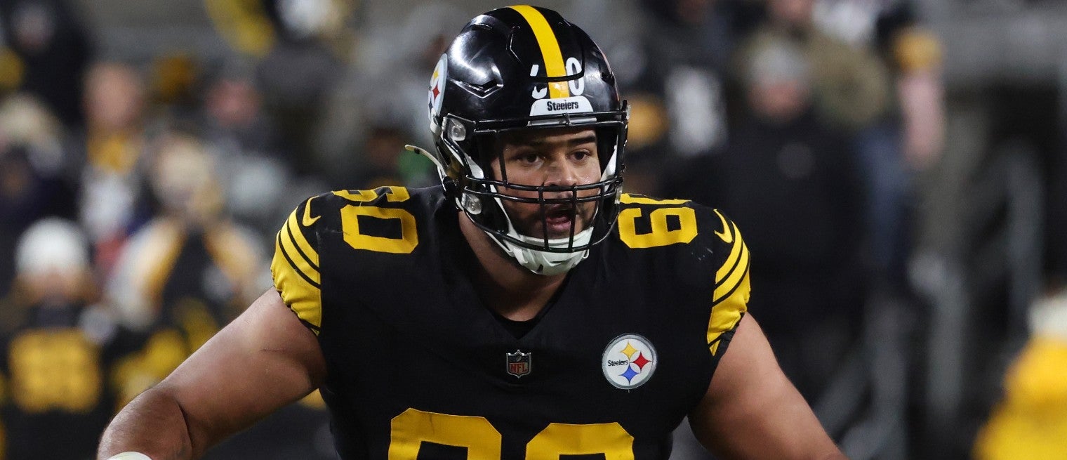 Dec 15, 2025; Pittsburgh, Pennsylvania, USA; Pittsburgh Steelers offensive tackle Dylan Cook (60) defends in the third quarter against the Miami Dolphins at Acrisure Stadium.