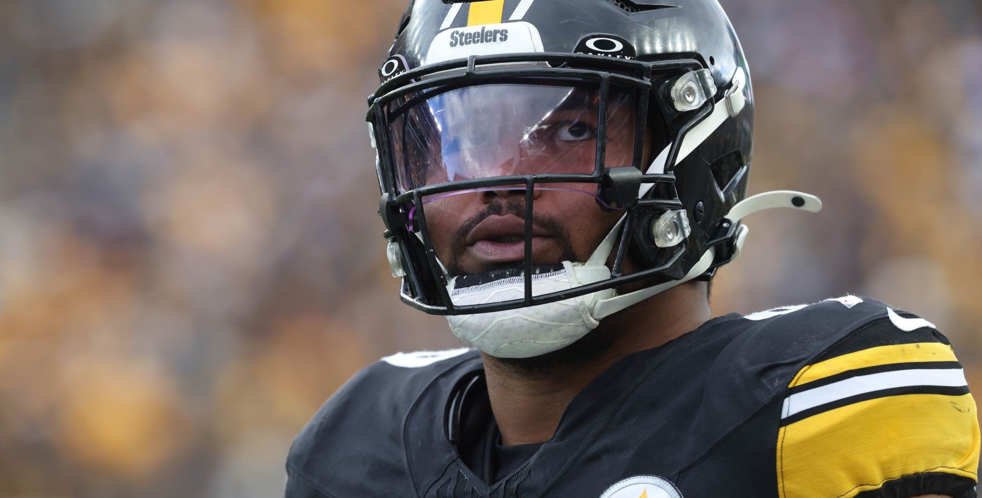 Nov 16, 2025; Pittsburgh, Pennsylvania, USA; Pittsburgh Steelers defensive tackle Derrick Harmon (99) looks on from the sidelines against the Cincinnati Bengals during the second quarter at Acrisure Stadium.