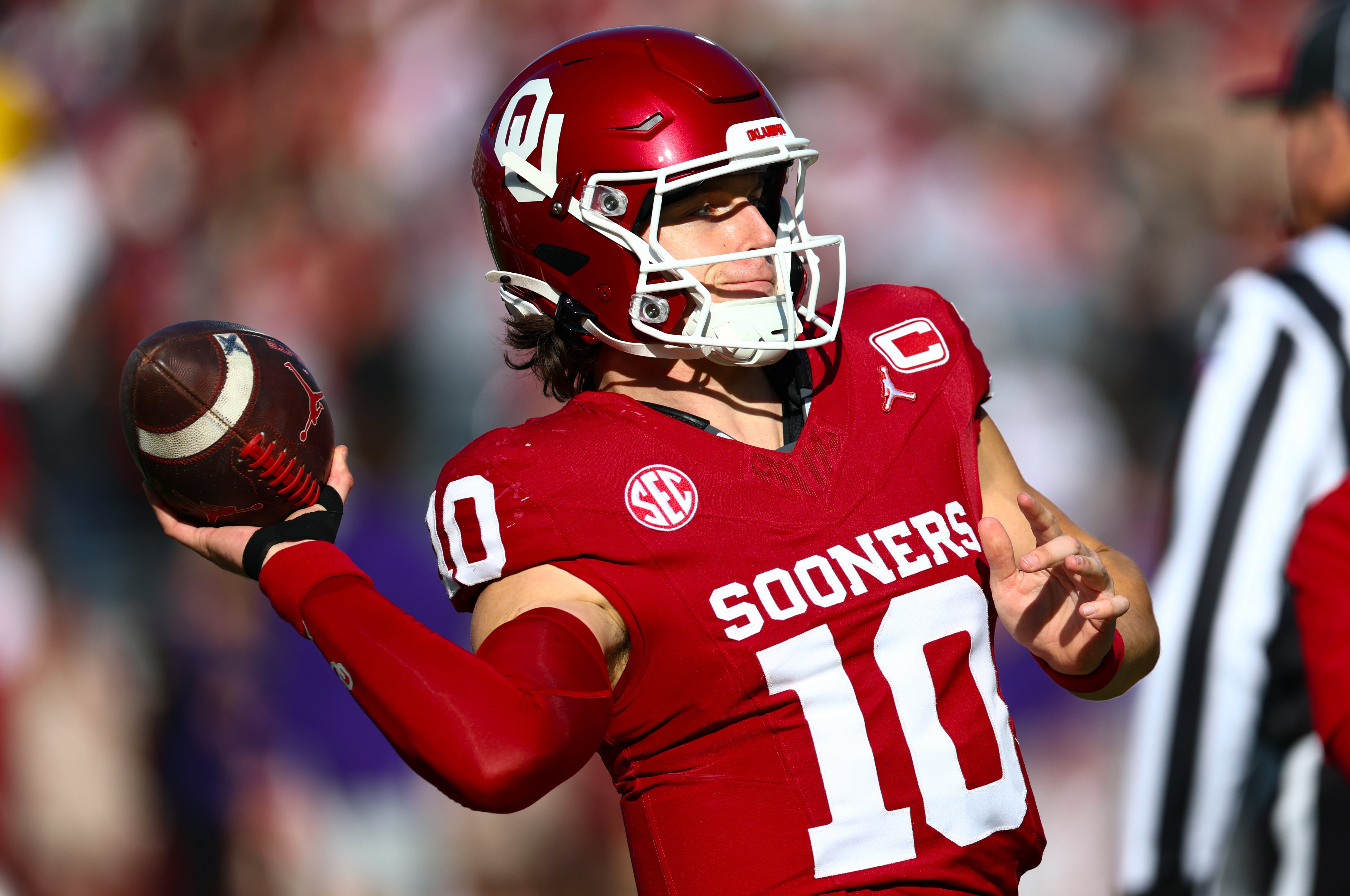 Oklahoma Sooners quarterback John Mateer hand and thumb injury tape