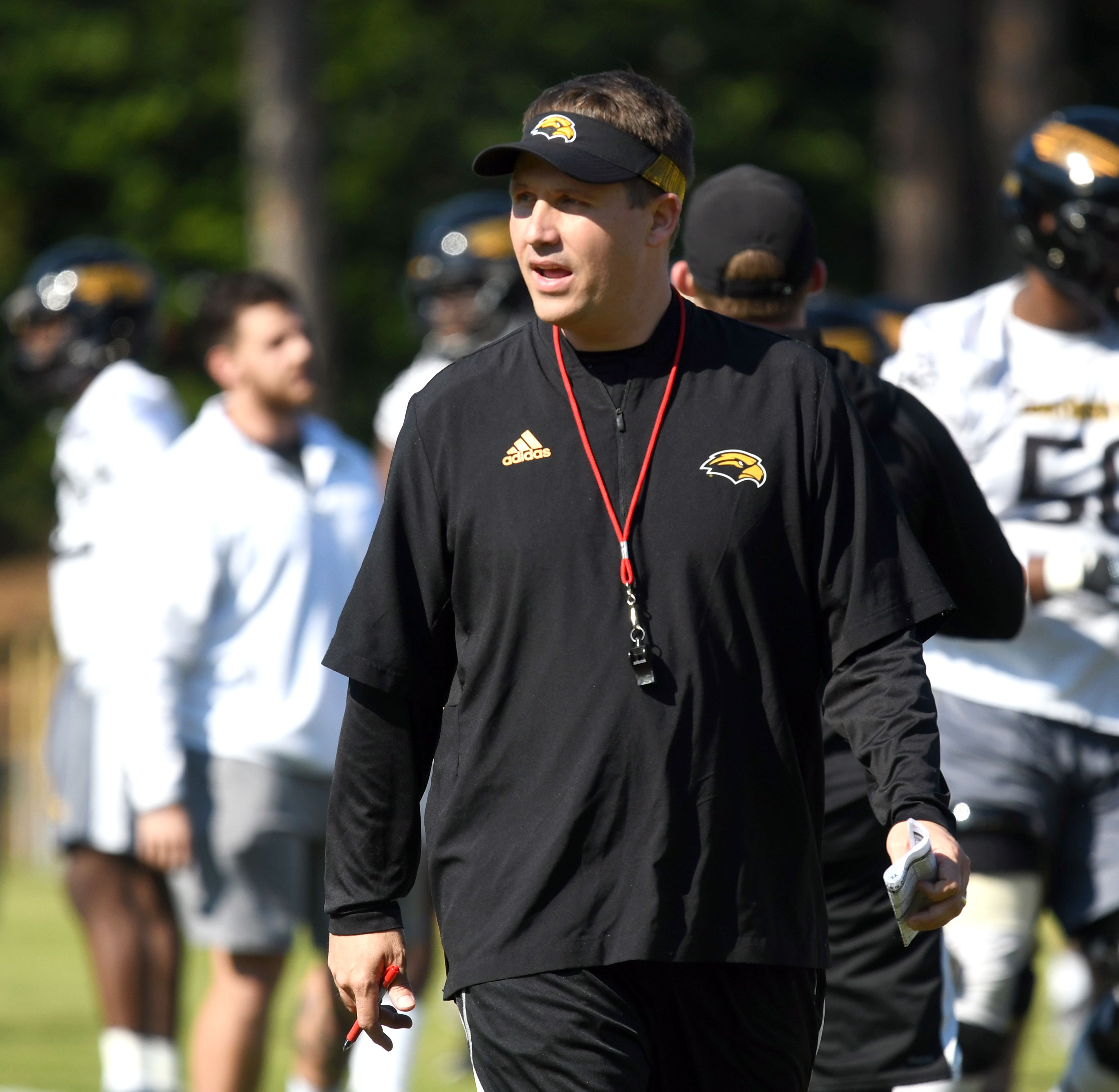 Southern Miss offensive coordinator Buster Faulkner coaches during the first day of spring practice in Hattiesburg on Tuesday, March 19, 2019.