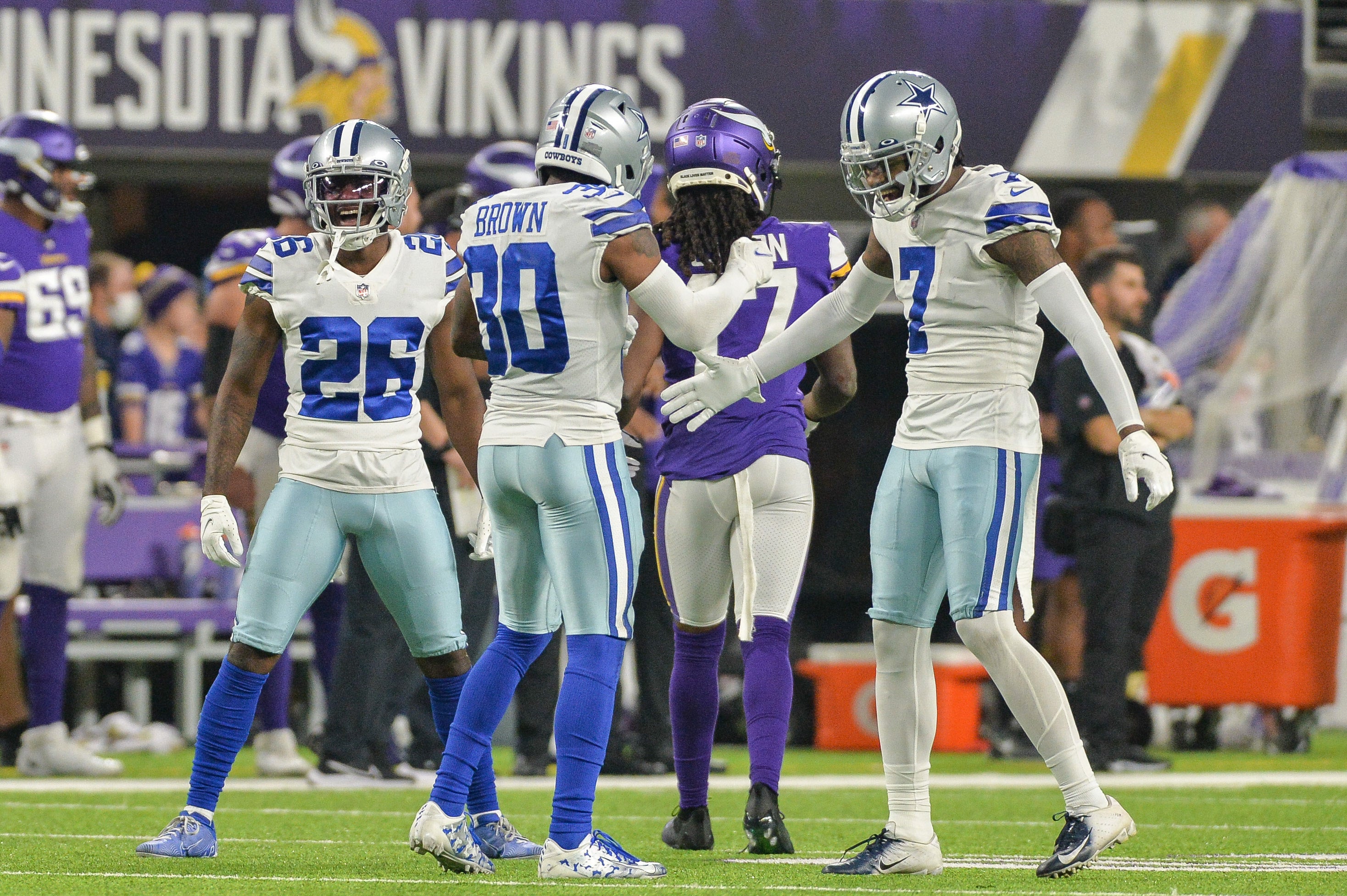 Oct 31, 2021; Minneapolis, Minnesota, USA; Dallas Cowboys cornerback Jourdan Lewis (26) and cornerback Anthony Brown (30) and cornerback Trevon Diggs (7) in action against the Minnesota Vikings during the first quarter at U.S. Bank Stadium.