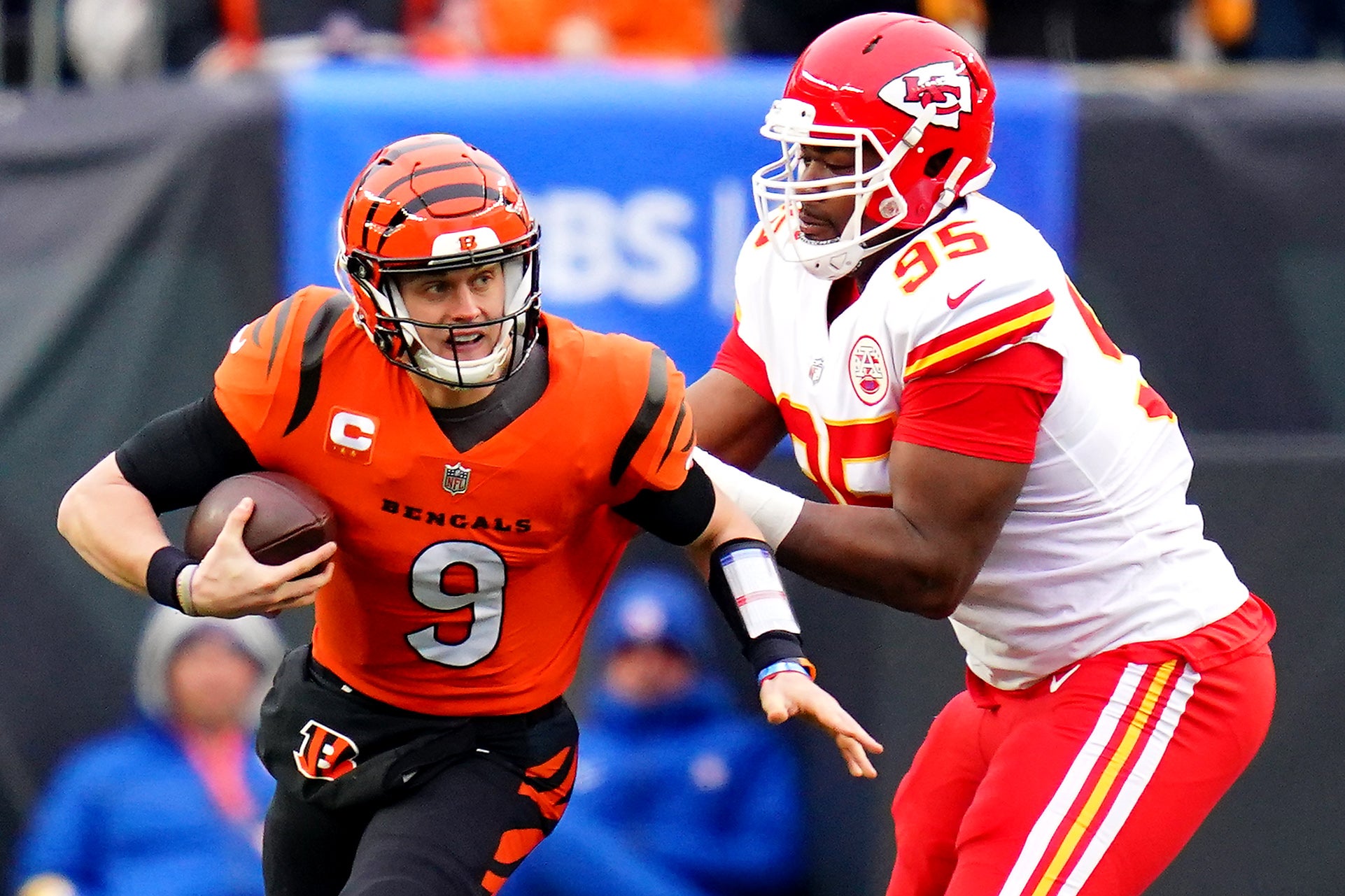 Jan 2, 2022; Cincinnati, OH, USA; Cincinnati Bengals quarterback Joe Burrow (9) is sacked by Kansas City Chiefs defensive end Chris Jones (95) in the first quarter during a Week 17 NFL game, Sunday, Jan. 2, 2022, at Paul Brown Stadium in Cincinnati.