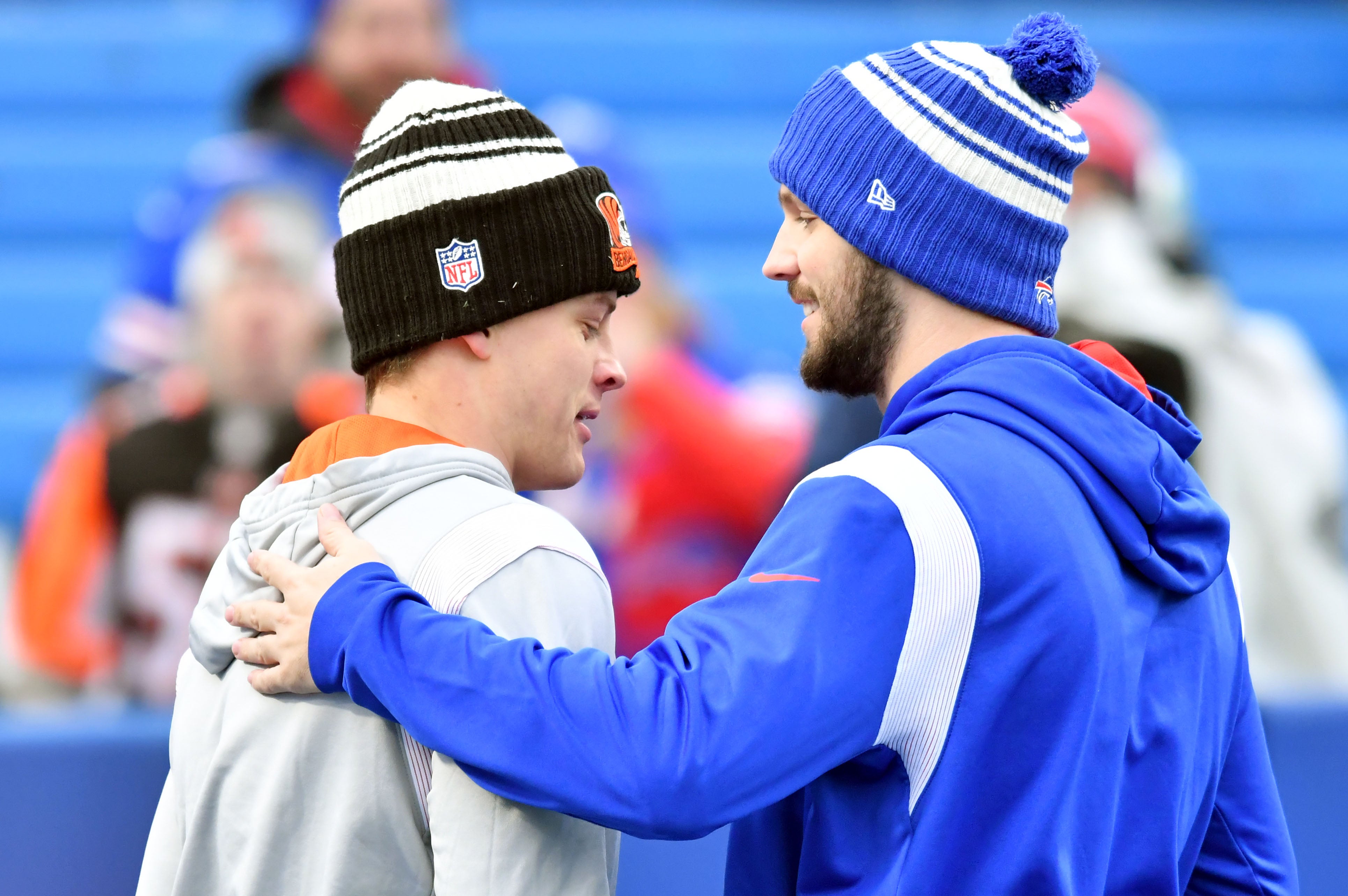 Jan 22, 2023; Orchard Park, New York, USA; Cincinnati Bengals quarterback Joe Burrow (9) talks with Buffalo Bills quarterback Josh Allen (17) before an AFC divisional round game between the Buffalo Bills and the Cincinnati Bengals at Highmark Stadium.