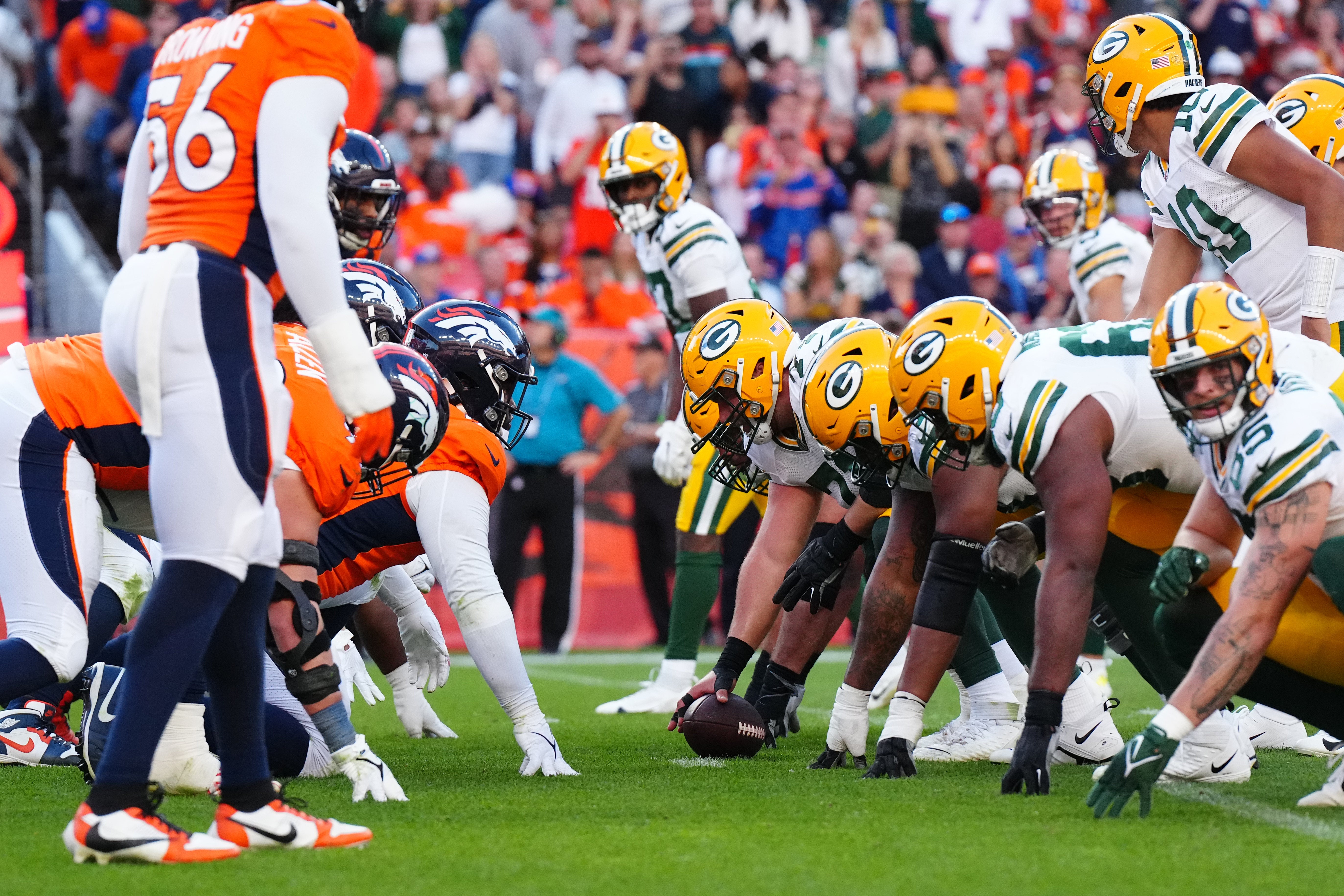 Oct 22, 2023; Denver, Colorado, USA; Members of the Green Bay Packers and the Denver Broncos during the second half at Empower Field at Mile High.