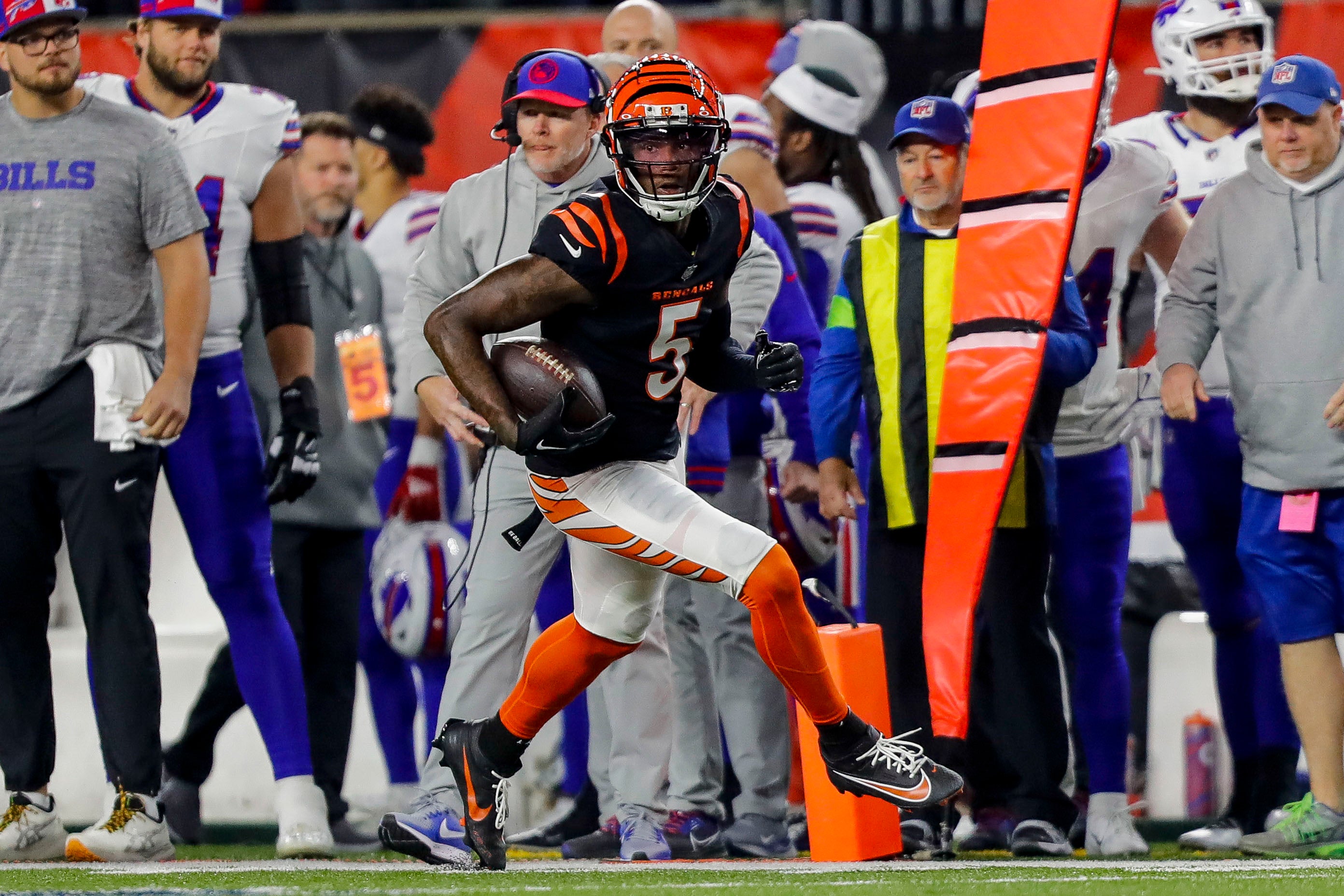 Nov 5, 2023; Cincinnati, Ohio, USA; Cincinnati Bengals wide receiver Tee Higgins (5) runs with the ball against the Buffalo Bills in the first half at Paycor Stadium.