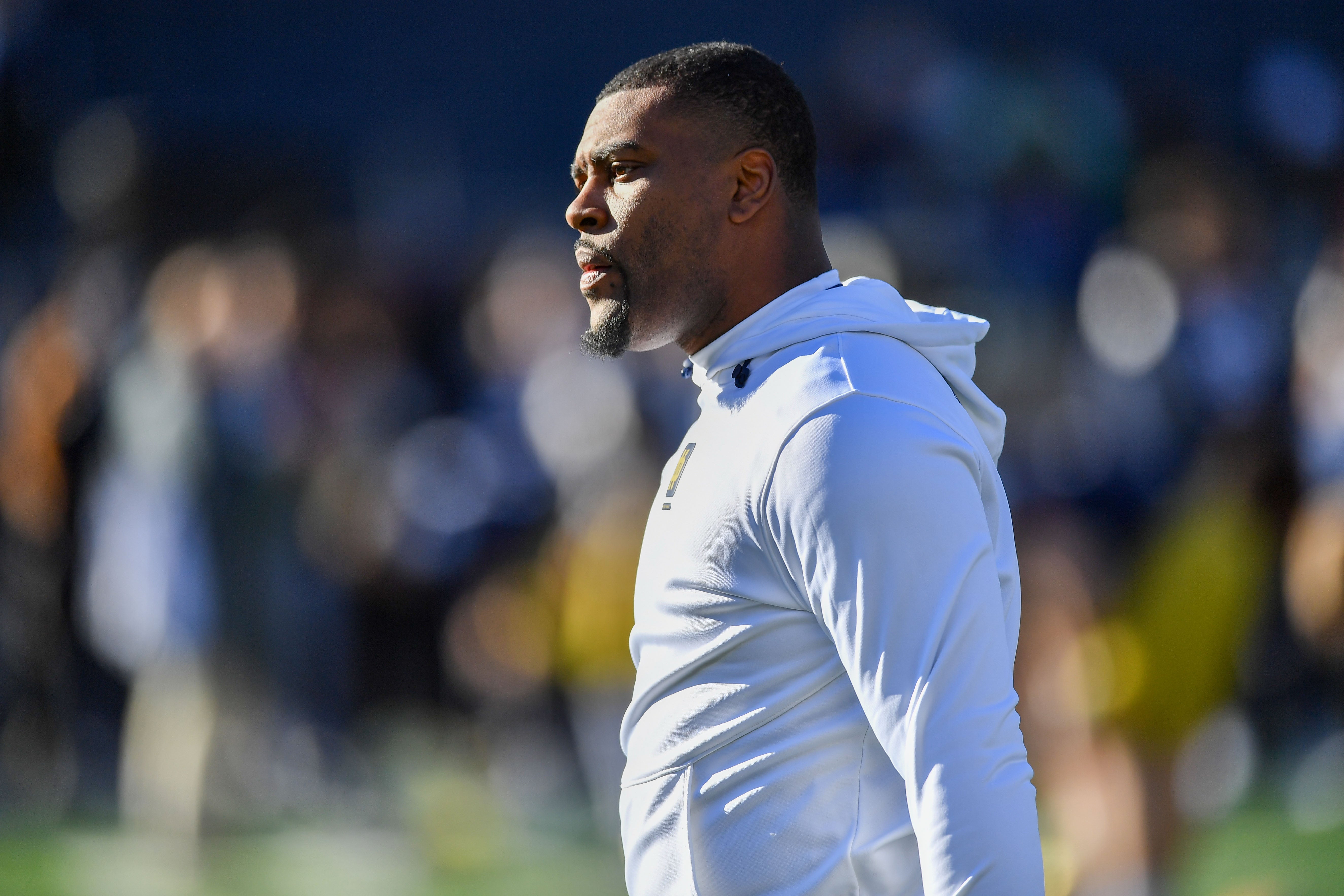 Nov 18, 2023; South Bend, Indiana, USA; Notre Dame Fighting Irish cornerbacks coach Mike Mickens watches warmups before the game against the Wake Forest Demon Deacons at Notre Dame Stadium. Mandatory Credit: Matt Cashore-USA TODAY Sports