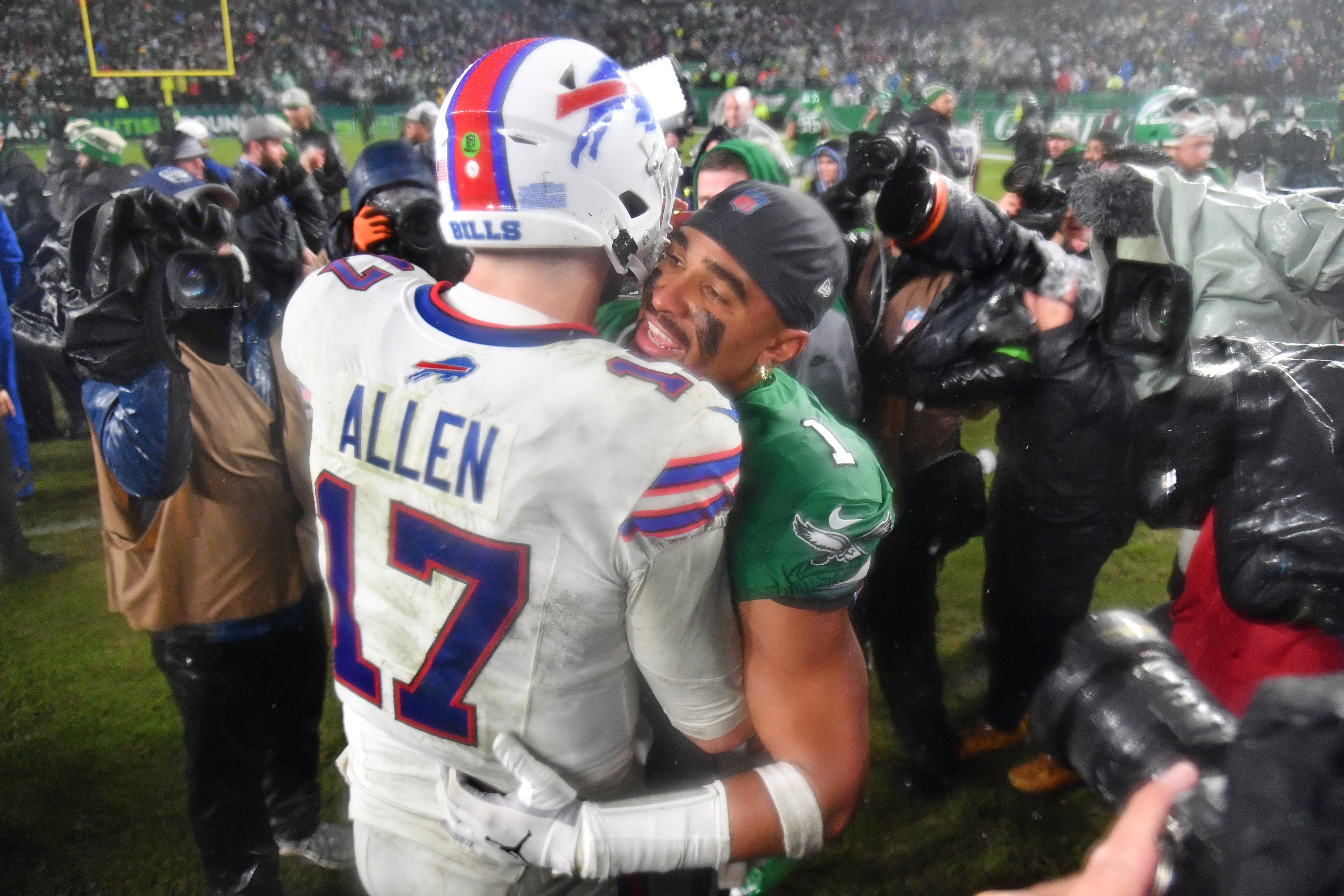 Nov 26, 2023; Philadelphia, Pennsylvania, USA; Buffalo Bills quarterback Josh Allen (17) and Philadelphia Eagles quarterback Jalen Hurts (1) meet on the field Eagles win in overtime at Lincoln Financial Field.