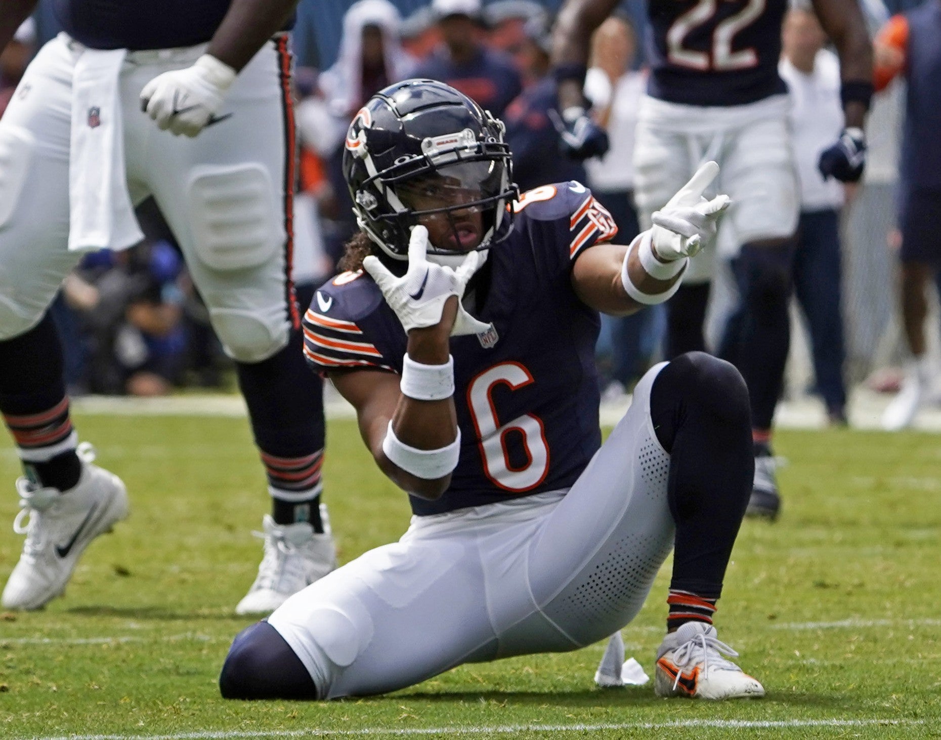 Aug 17, 2024; Chicago, Illinois, USA; Chicago Bears cornerback Kyler Gordon (6) gestures after sacking Cincinnati Bengals quarterback Logan Woodside (11) during the first half at Soldier Field.