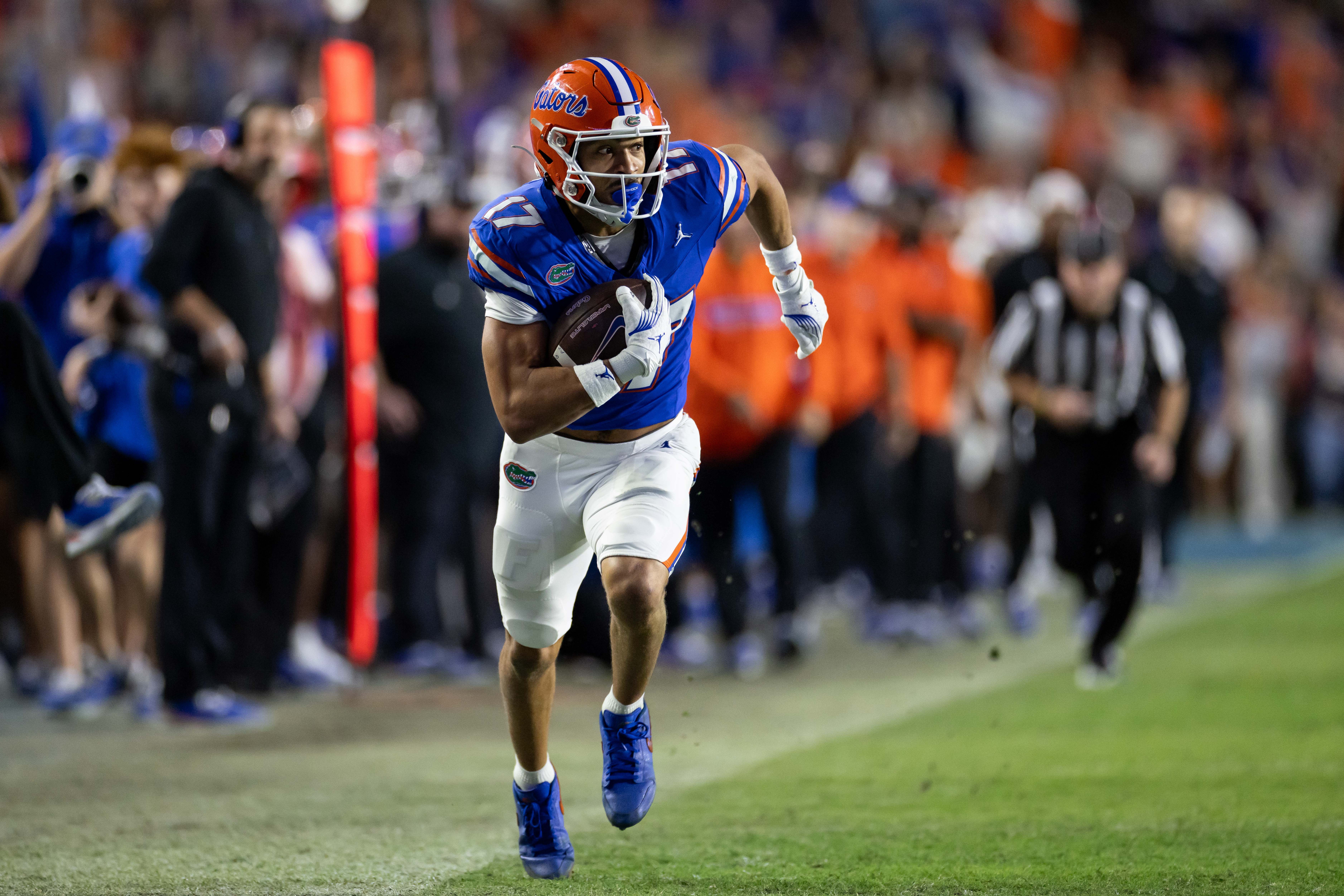 Oct 19, 2024; Gainesville, Florida, USA; Florida Gators wide receiver Chimere Dike (17) runs with the ball against the Kentucky Wildcats during the second half at Ben Hill Griffin Stadium.