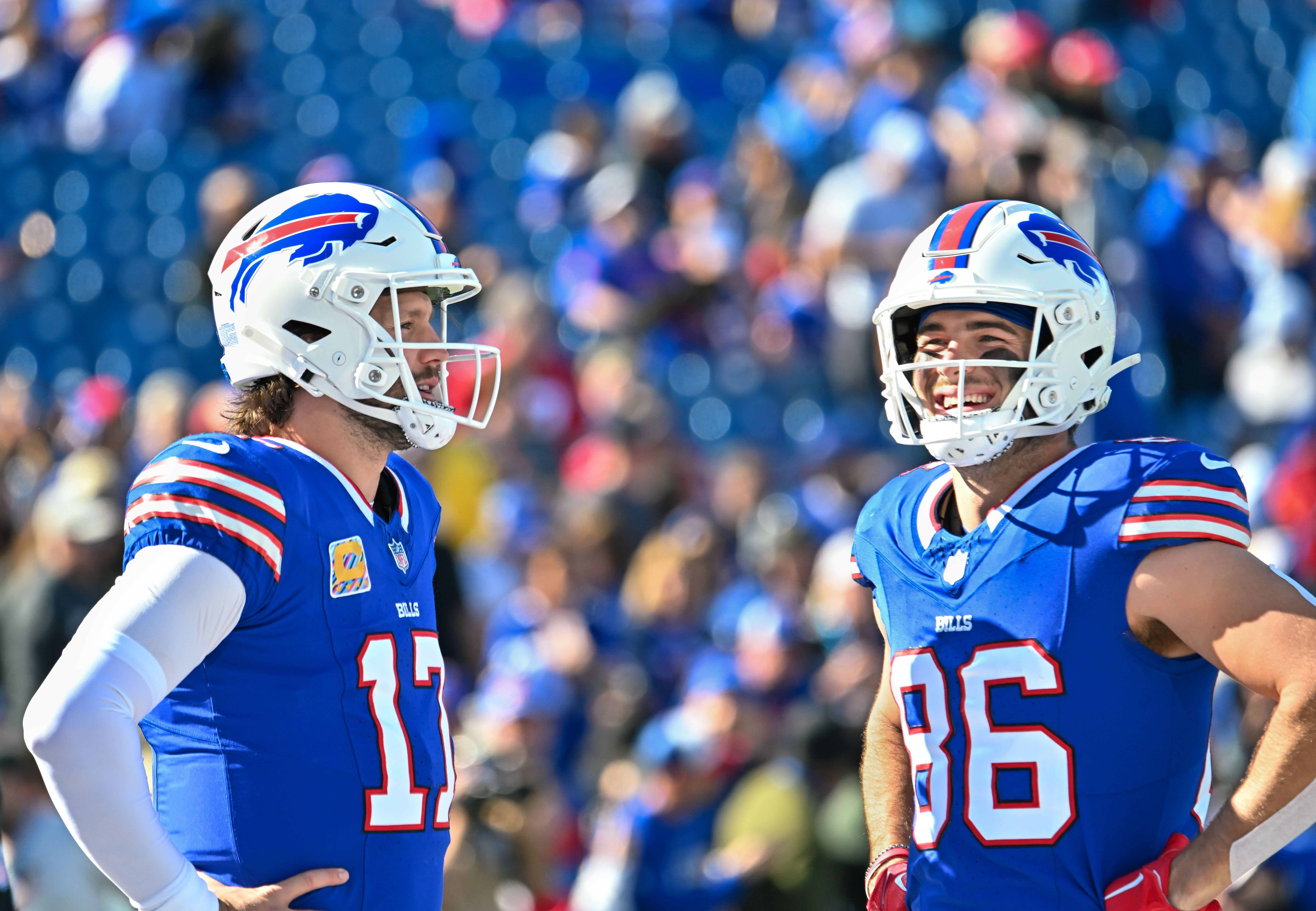 Oct 20, 2024; Orchard Park, New York, USA; Buffalo Bills quarterback Josh Allen (17) and tight end Dalton Kincaid (86) have a word before a game against the Tennessee Titans at Highmark Stadium.