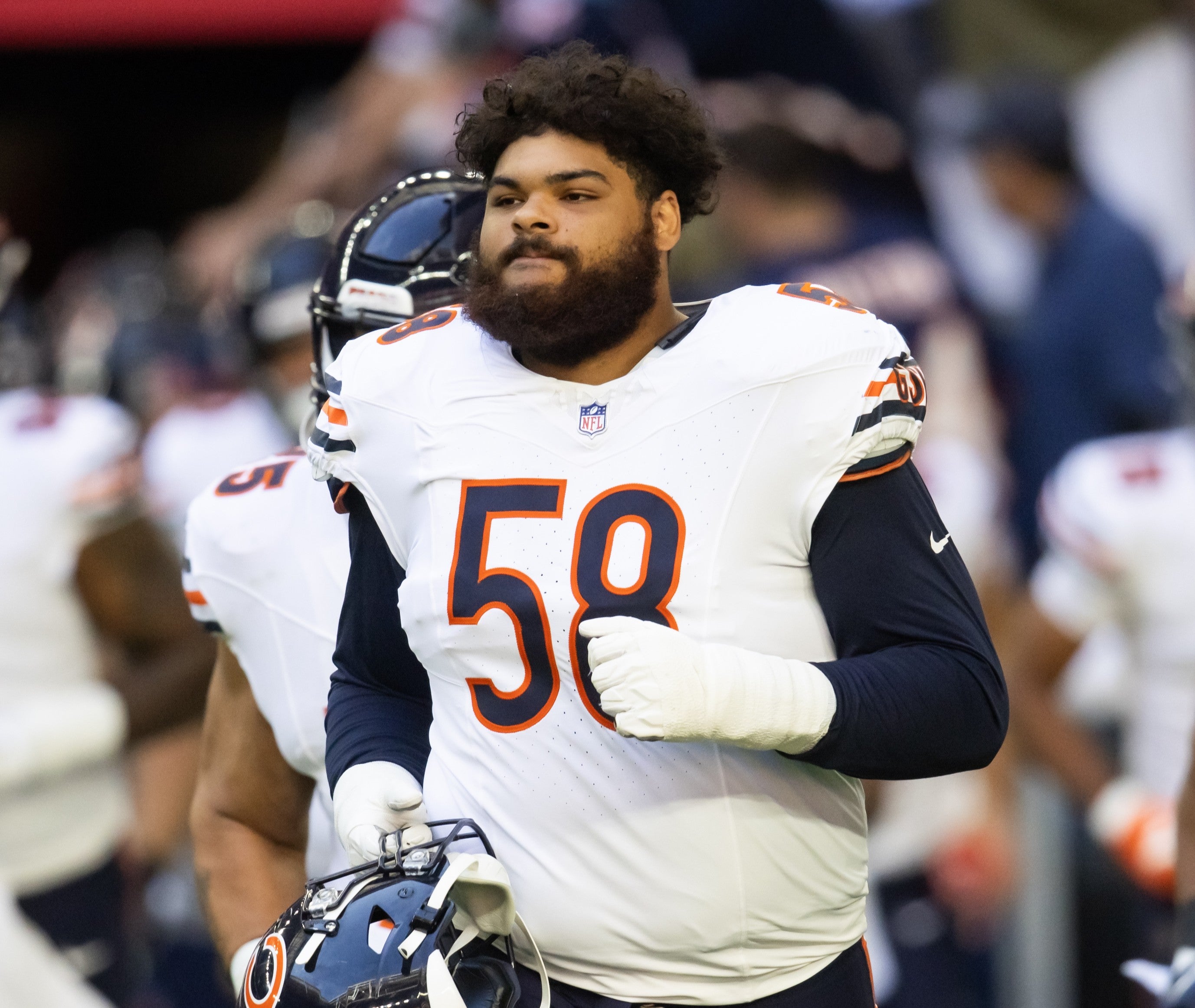 Nov 3, 2024; Glendale, Arizona, USA; Chicago Bears offensive tackle Darnell Wright (58) against the Arizona Cardinals at State Farm Stadium.