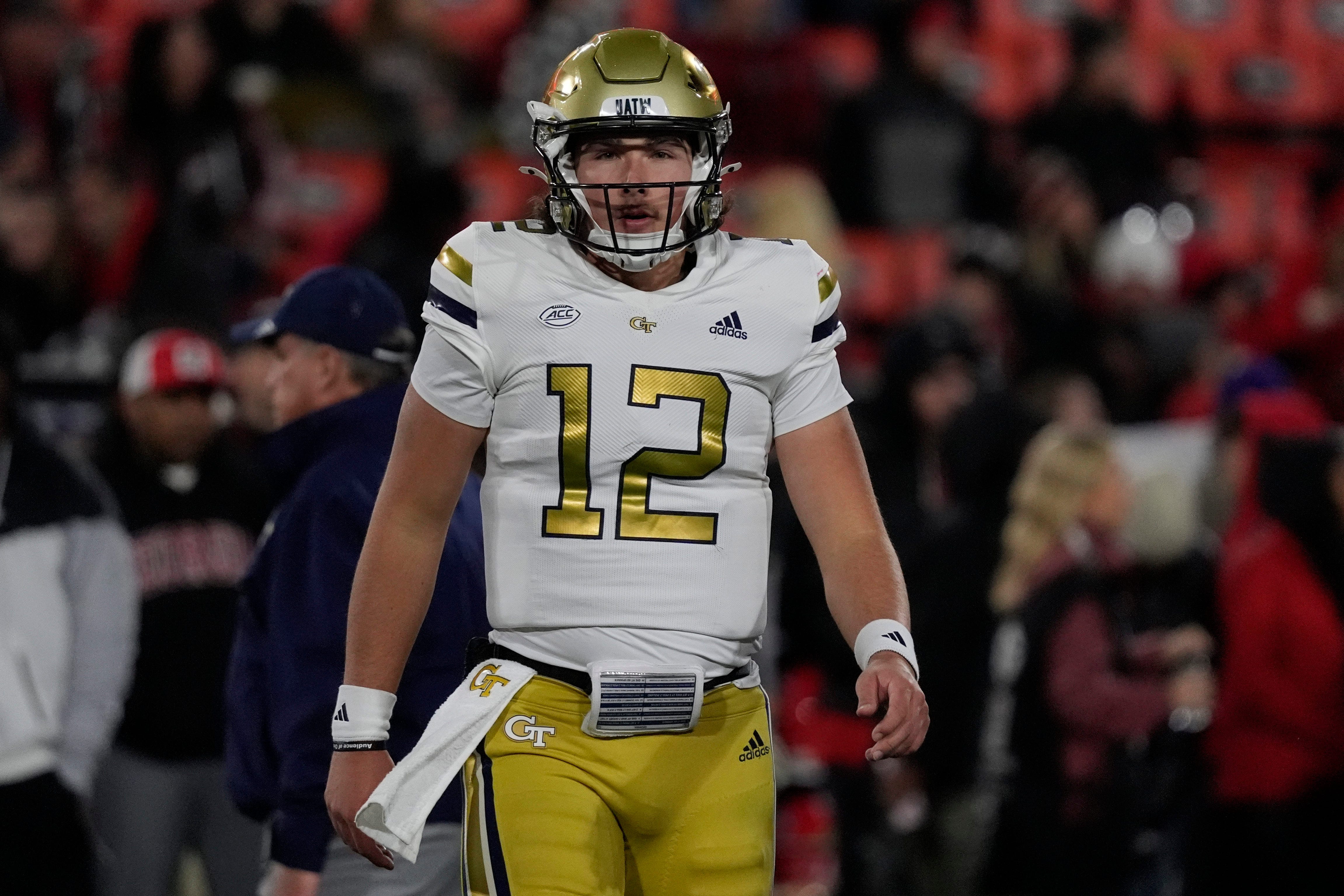 Georgia Tech quarterback Aaron Philo (12) warms up before the start of a NCAA college football game against Georgia in Athens, Ga., on Friday, Nov. 29, 2024. Philo played his high school football in the Athens area winning a state championship at Prince Avenue Christian.