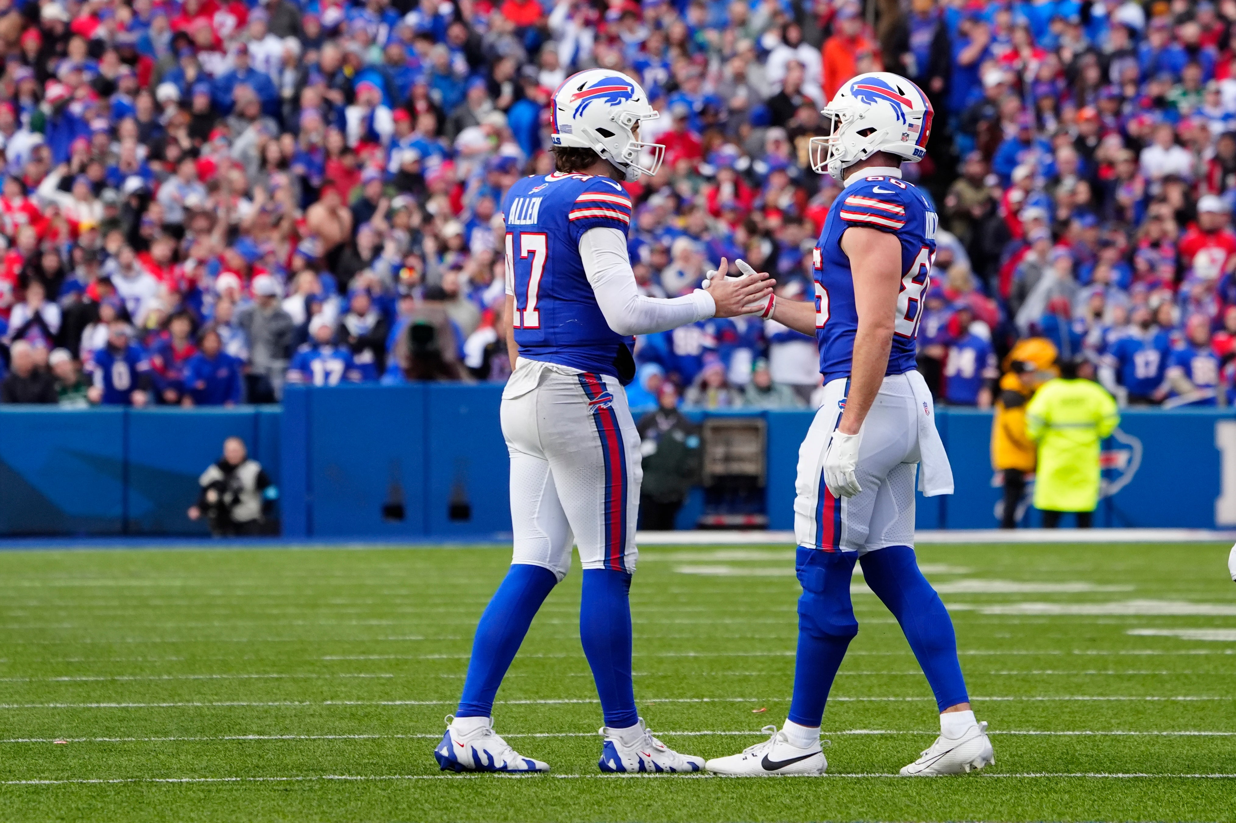 Dec 29, 2024; Orchard Park, New York, USA; Buffalo Bills tight end Dalton Kincaid (86) congratulates Buffalo Bills quarterback Josh Allen (17) for throwing a touchdown pass against the New York Jets during the second half at Highmark Stadium.