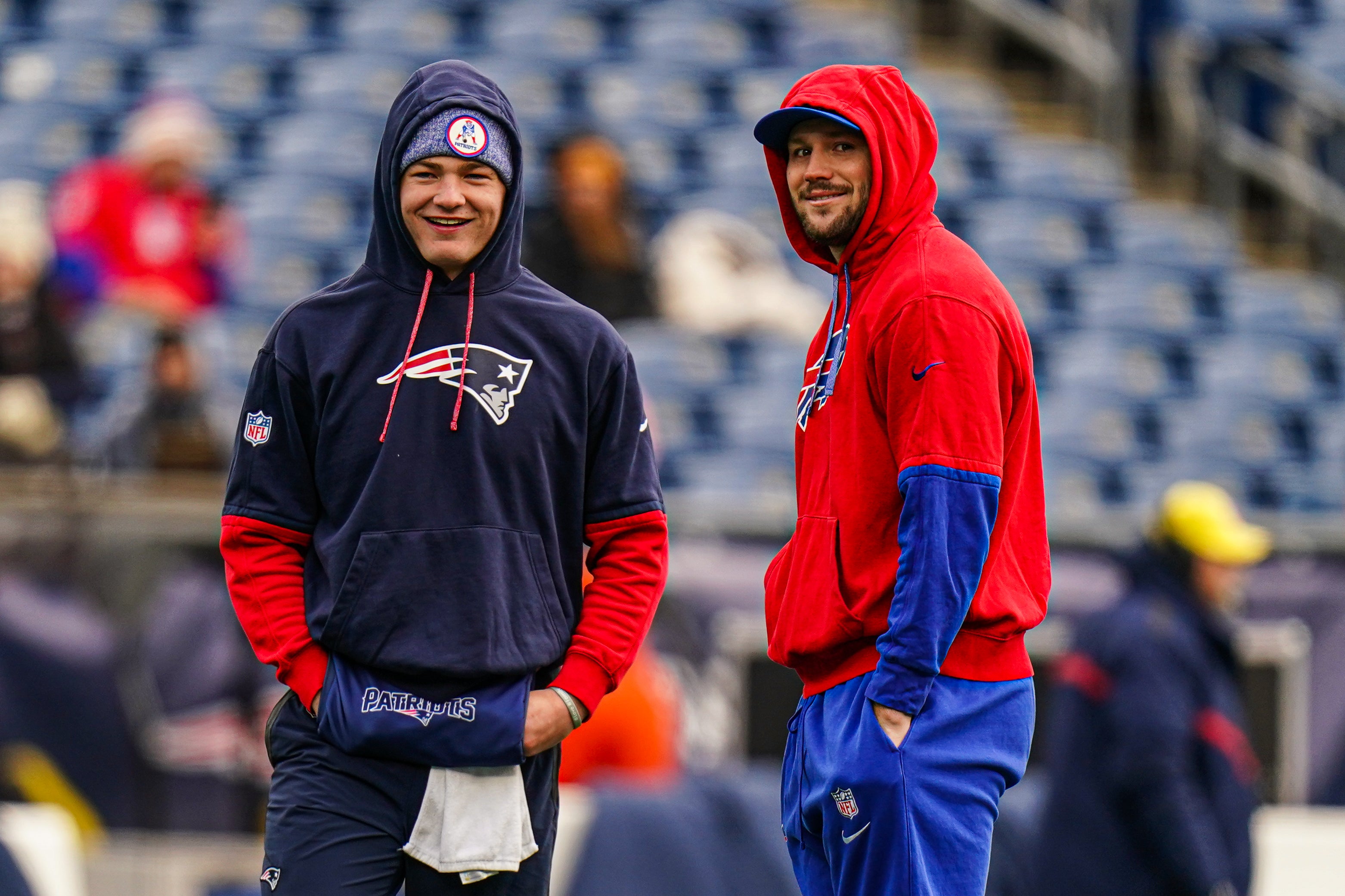 Jan 5, 2025; Foxborough, Massachusetts, USA; Buffalo Bills quarterback Josh Allen (17) and New England Patriots quarterback Drake Maye (10) talk on the field before the start of the game at Gillette Stadium.