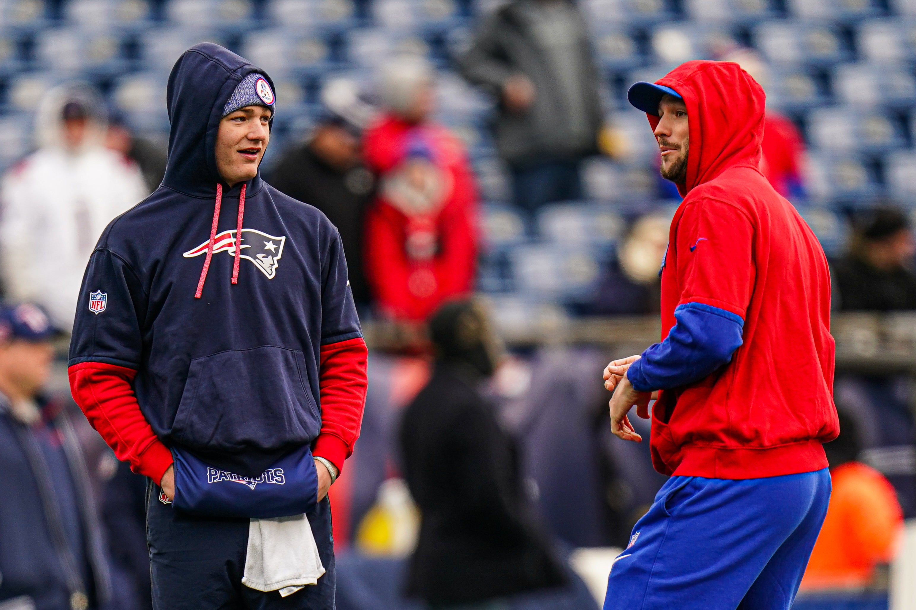 Jan 5, 2025; Foxborough, Massachusetts, USA; Buffalo Bills quarterback Josh Allen (17) and New England Patriots quarterback Drake Maye (10) talk on the field before the start of the game at Gillette Stadium.
