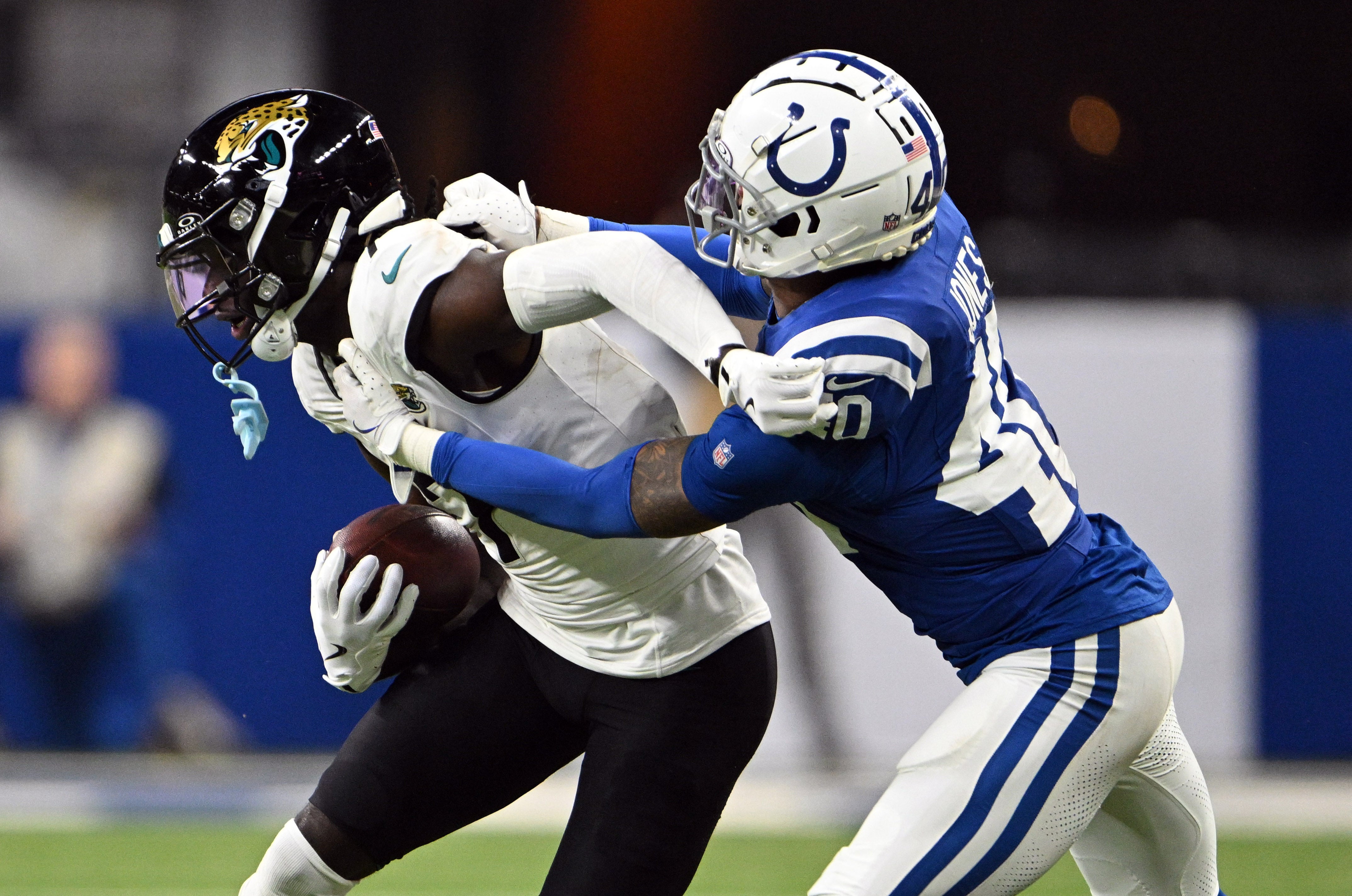 Colts CB Jaylon Jones attempts to tackle Jaguars WR Brian Thomas Jr.