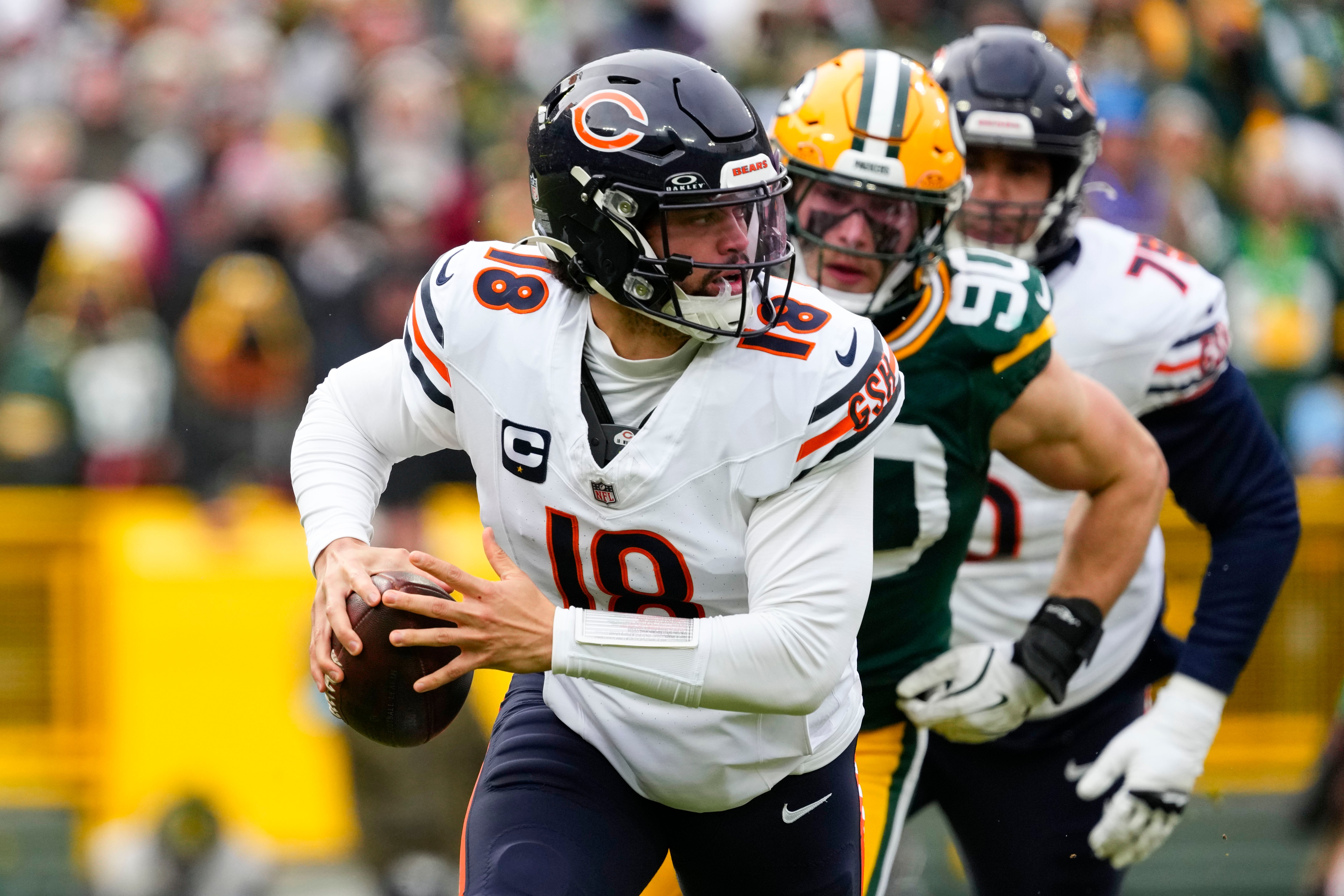 Jan 5, 2025; Green Bay, Wisconsin, USA; Chicago Bears quarterback Caleb Williams (18) during the game against the Chicago Bears at Lambeau Field.