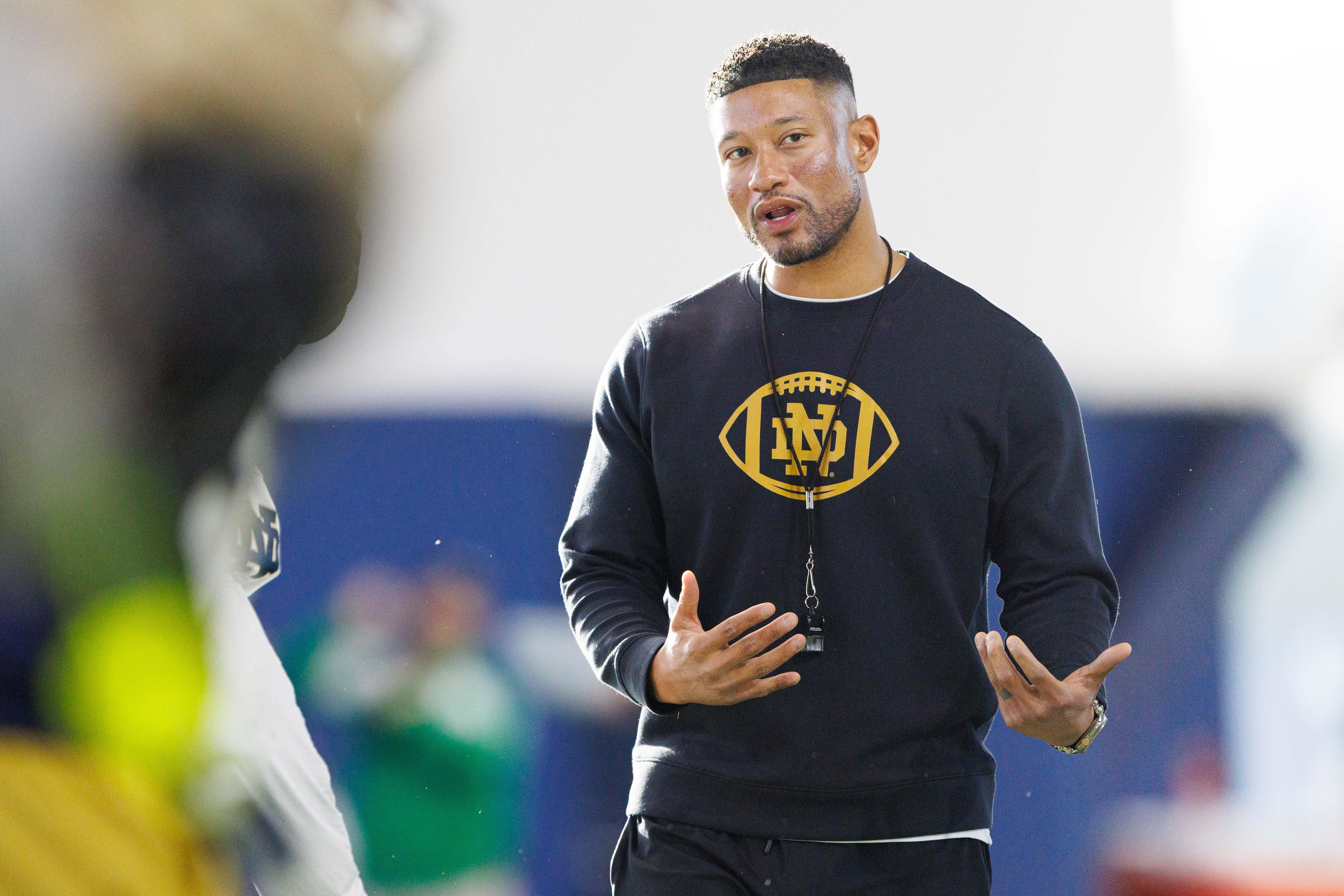 Notre Dame head coach Marcus Freeman greets his players during a Notre Dame football spring practice at Irish Athletic Center on Wednesday, March 19, 2025, in South Bend.
