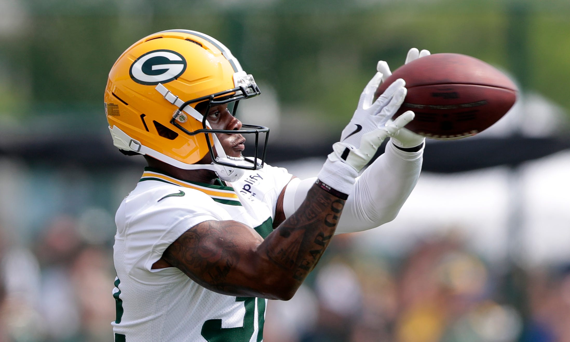 Green Bay Packers running back MarShawn Lloyd (32) participates in drills during the third day of training camp on July 25, 2025, at Ray Nitschke Field in Ashwaubenon, Wis.